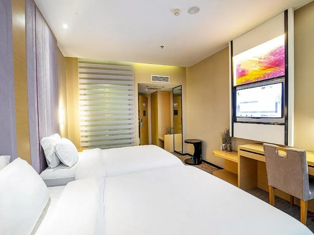 Bed in Lavande Hotel Leshan High-speed Railway Station Wanda Plaza
