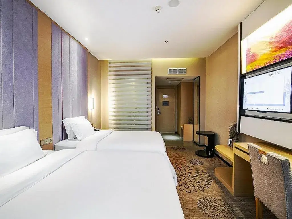 Bed in Lavande Hotel Leshan High-speed Railway Station Wanda Plaza Bed in Lavande Hotel Leshan High-speed Railway Station Wanda Plaza
