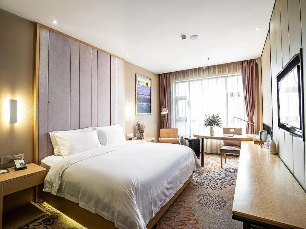 Bed in Lavande Hotel Leshan High-speed Railway Station Wanda Plaza