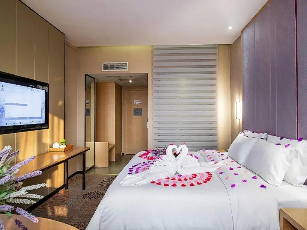 Bed in Lavande Hotel Leshan High-speed Railway Station Wanda Plaza Bed in Lavande Hotel Leshan High-speed Railway Station Wanda Plaza