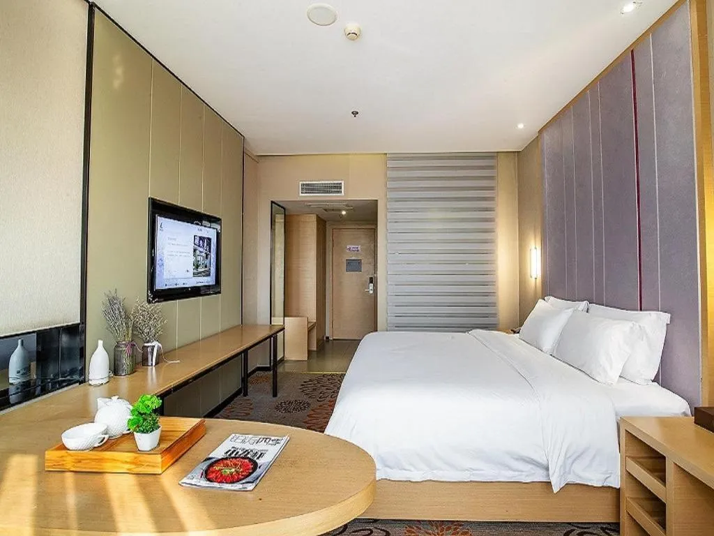 Bed in Lavande Hotel Leshan High-speed Railway Station Wanda Plaza