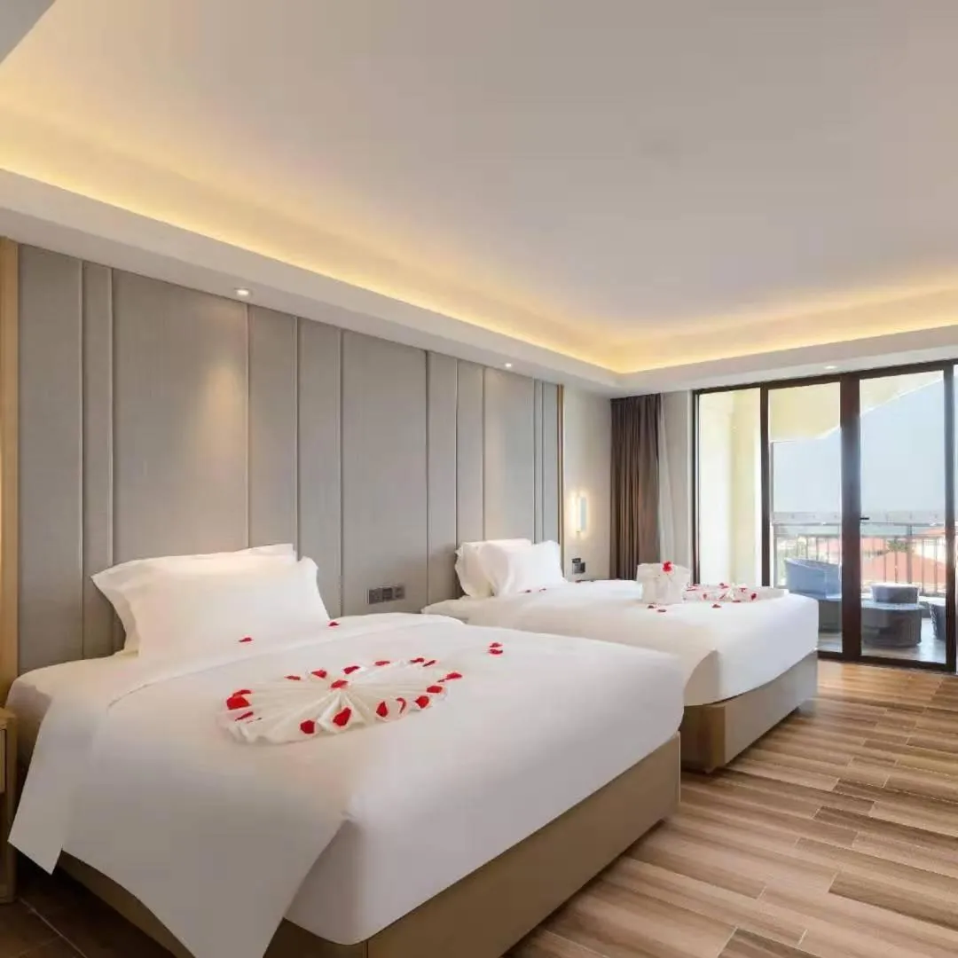 Bed in Lifeng Hotel (Haikou West Coast)