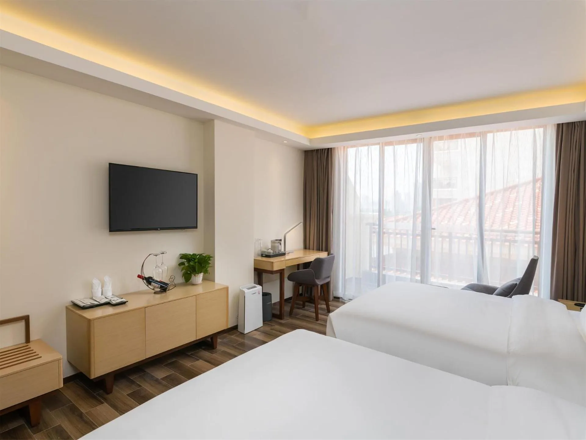 Bed in Lifeng Hotel (Haikou West Coast)