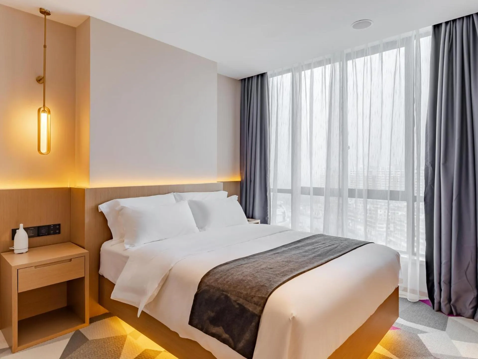 Bed in Lavande Hotel Lujiang Zhouyu Avenue