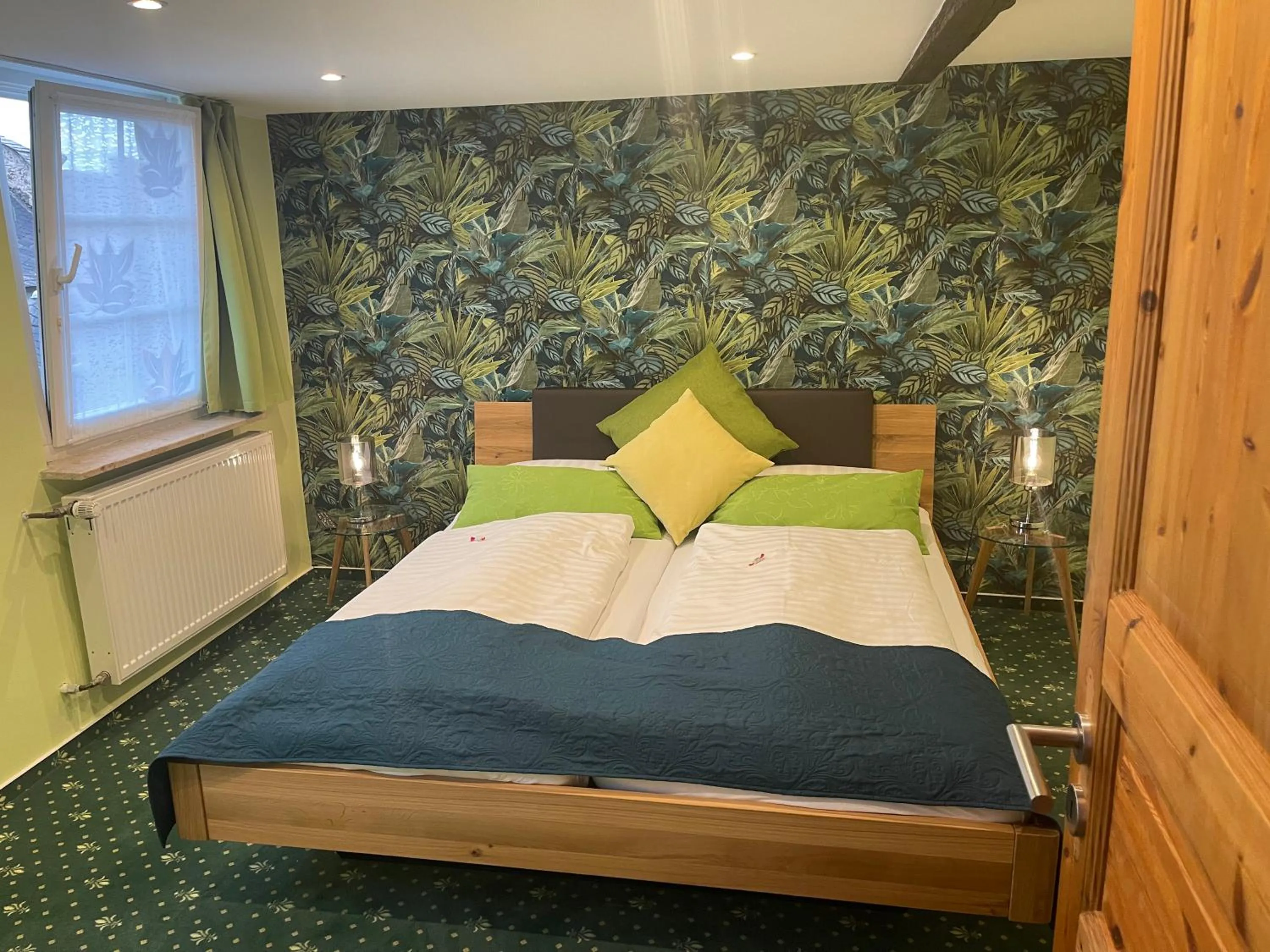 Bed in Hotel Garni Maaß