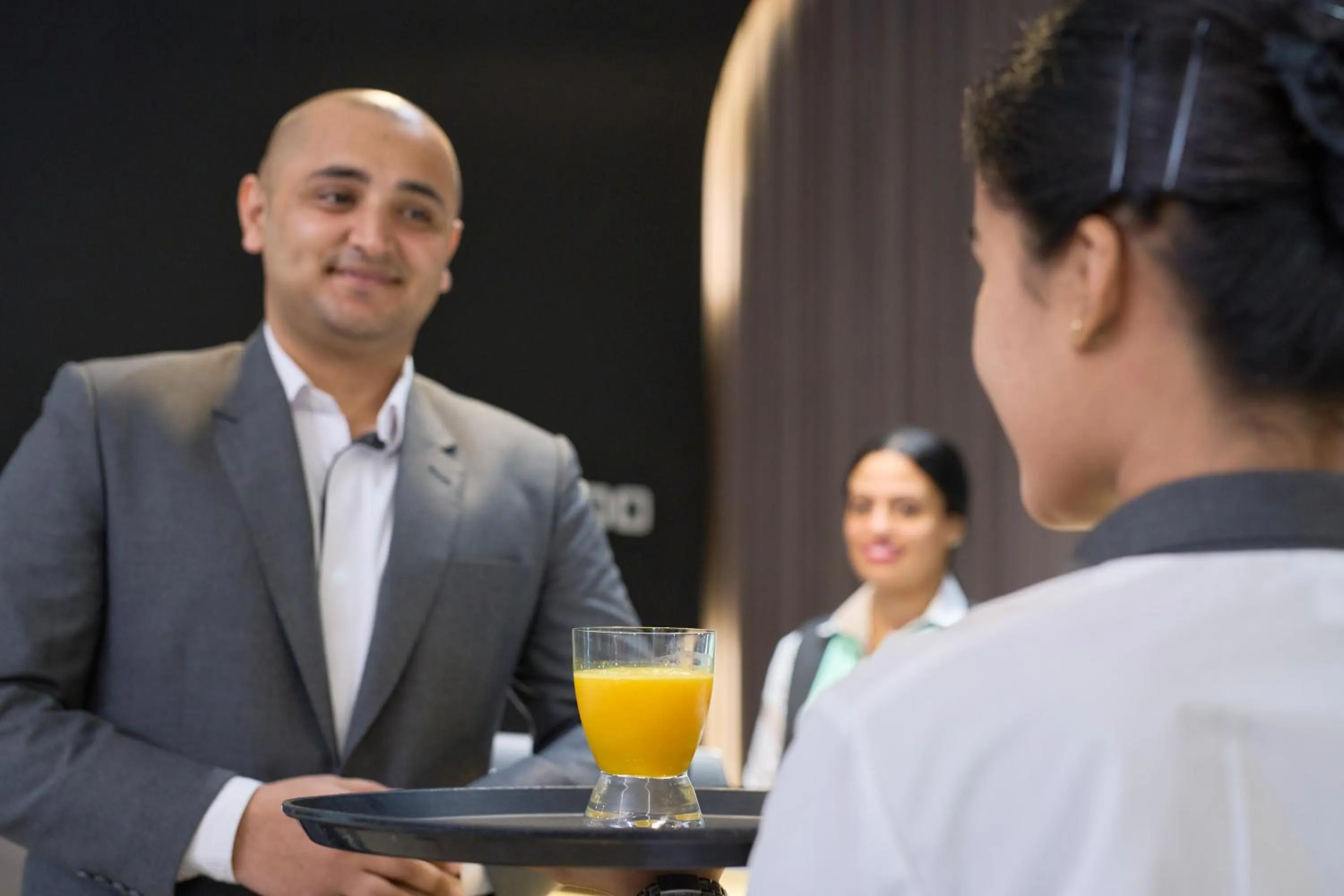 Staff in Hotel Holiday International