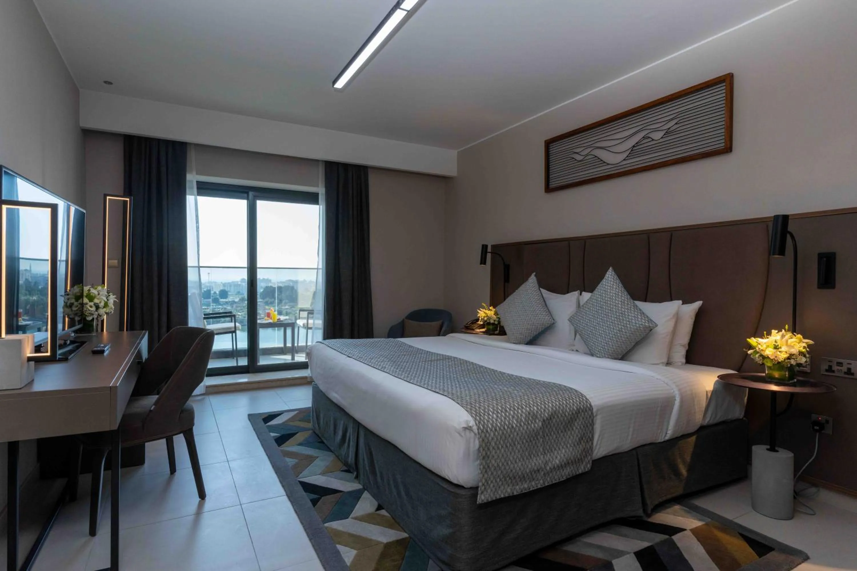 Bed in Hotel Holiday International