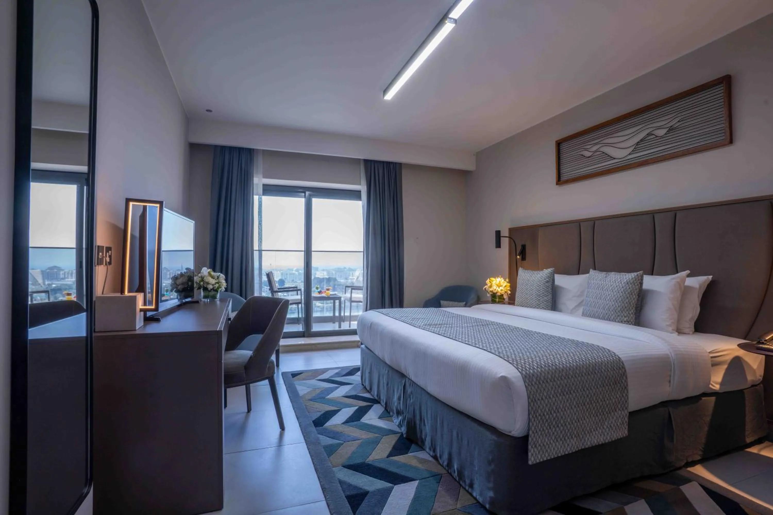 Bed in Hotel Holiday International