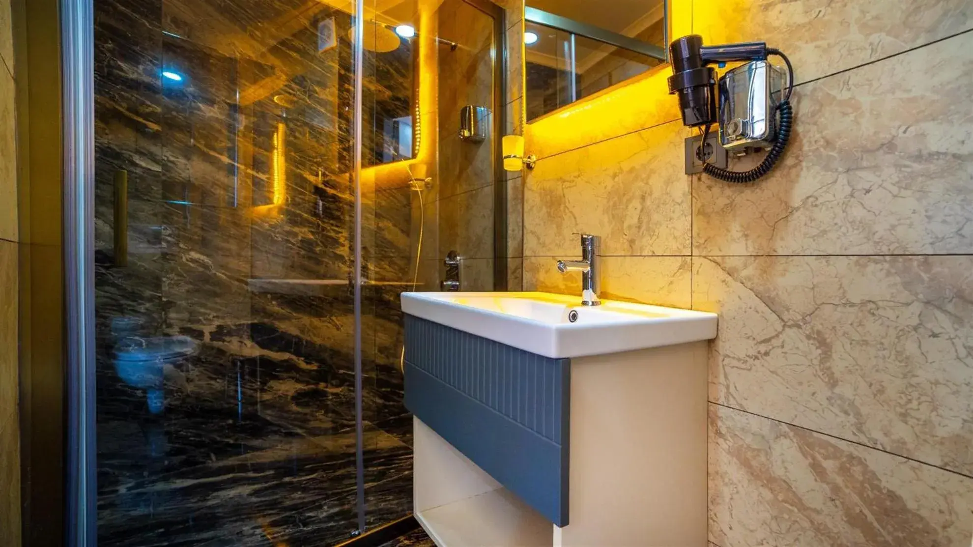 Bathroom in Blue Marina Hotel & Spa Bathroom in Blue Marina Hotel & Spa