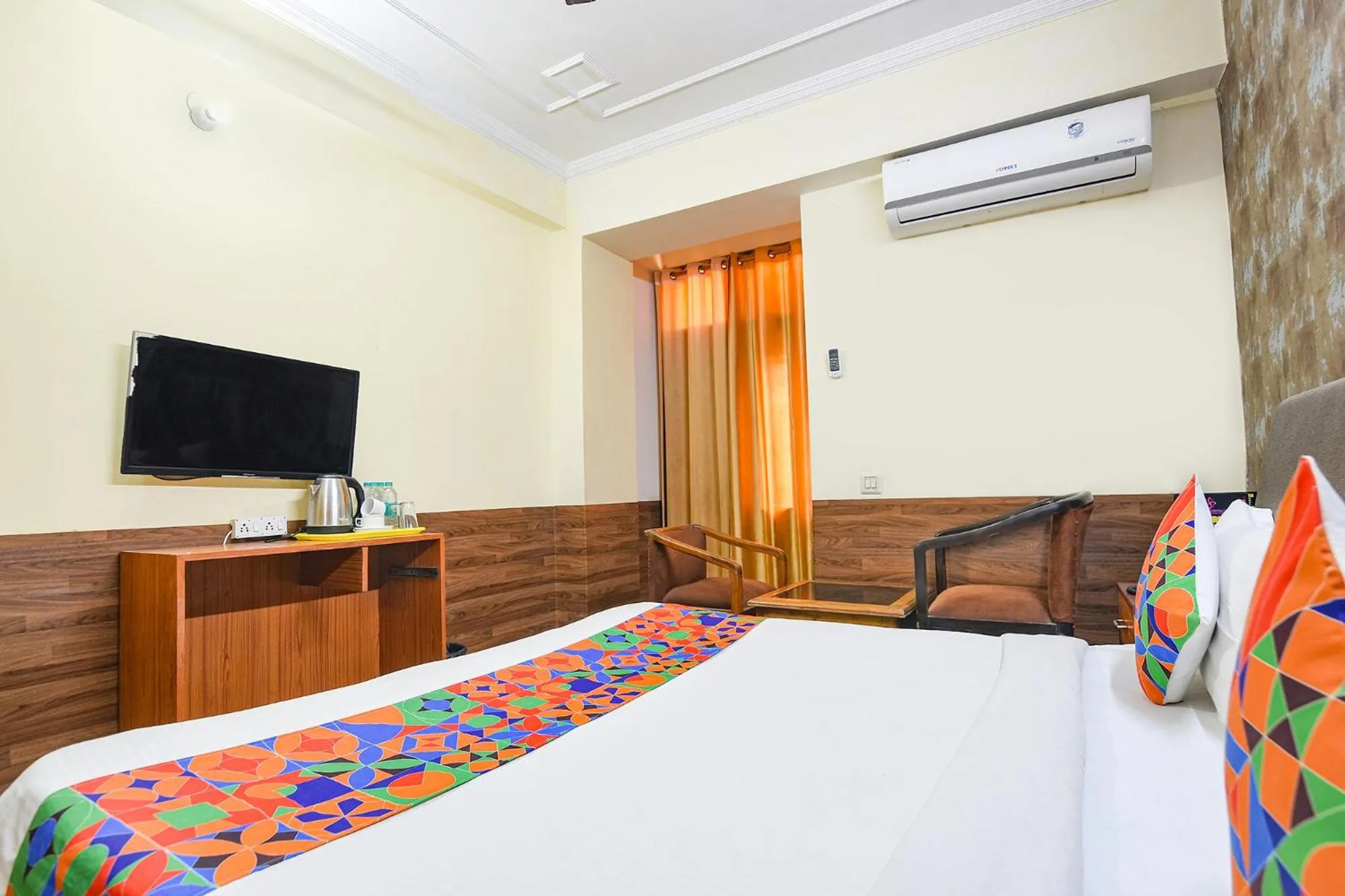 Bed in FabHotel Prime Praathana