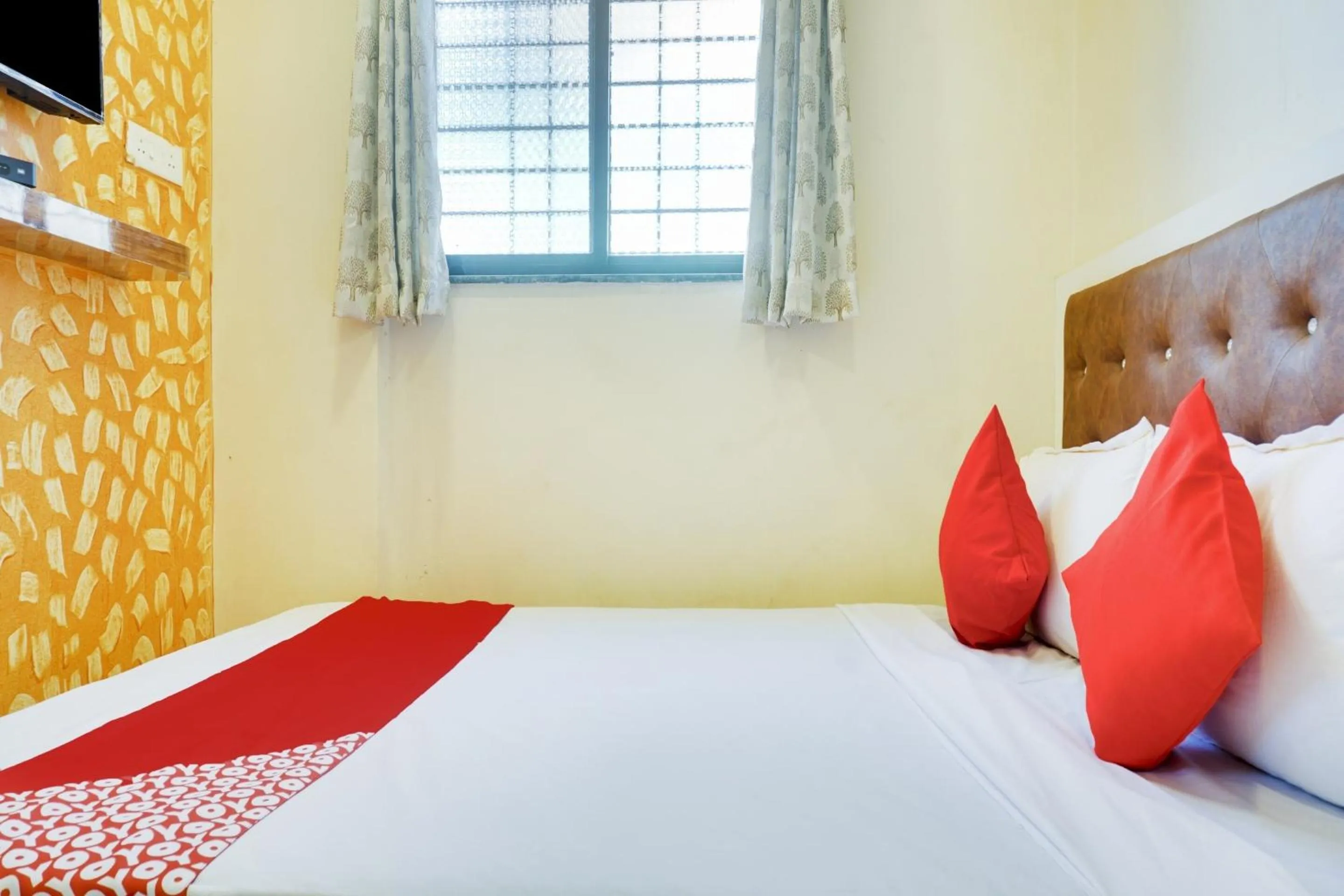 Bedroom in Hotel O Vijay Residency