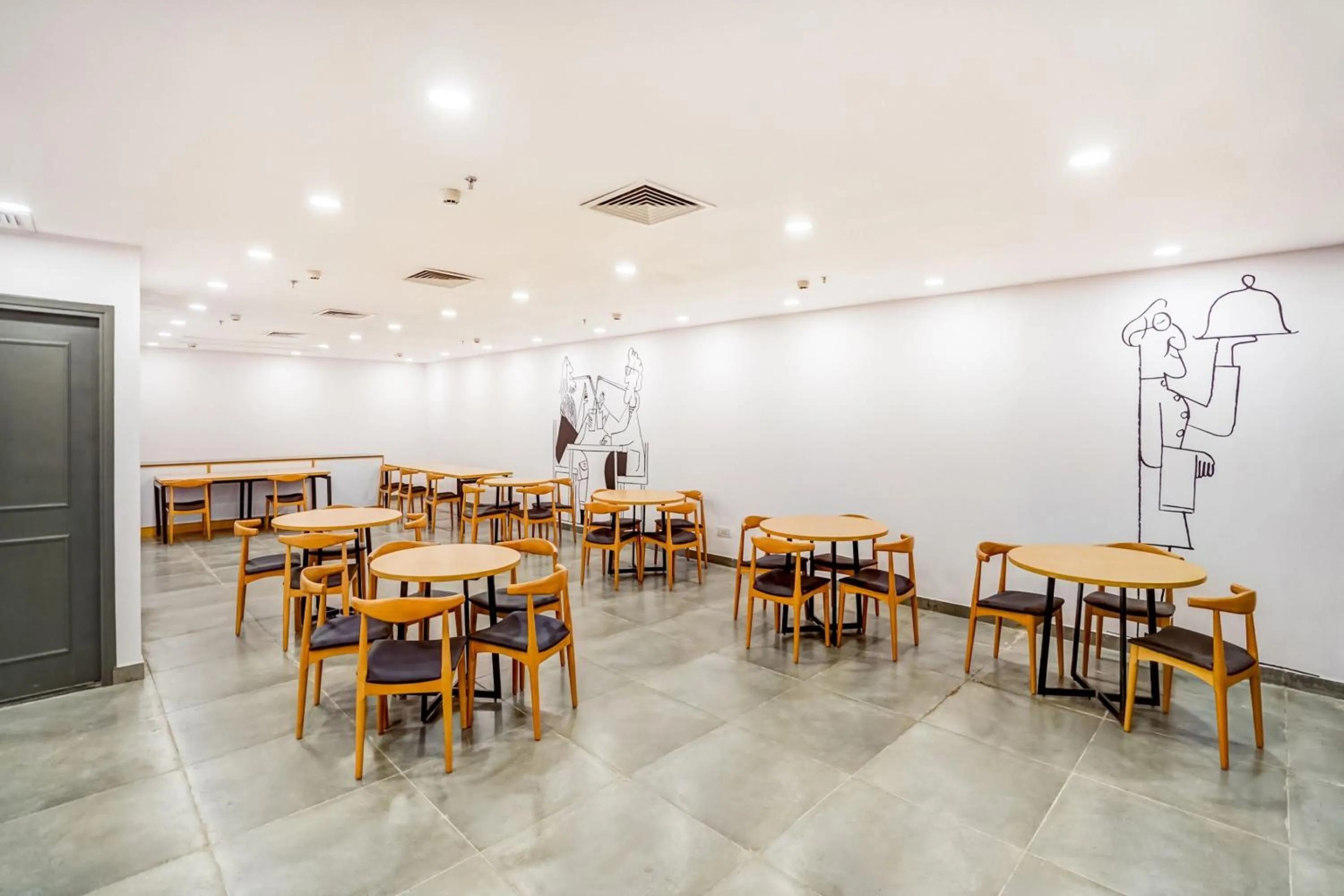Dining area in Super Townhouse Sector 19 Fun Republic Mall Indiranagar