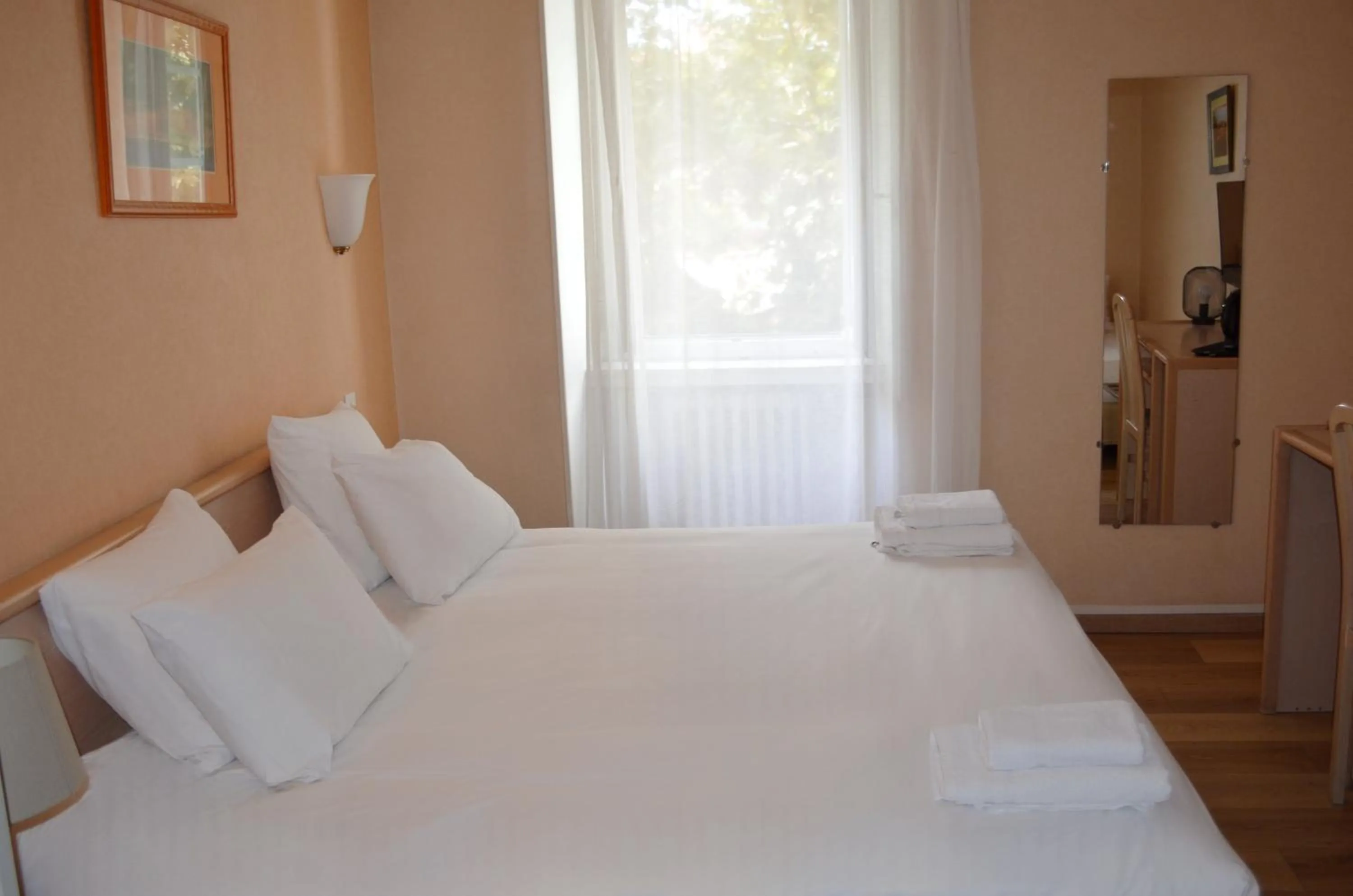 Bed in Hôtel du Parc