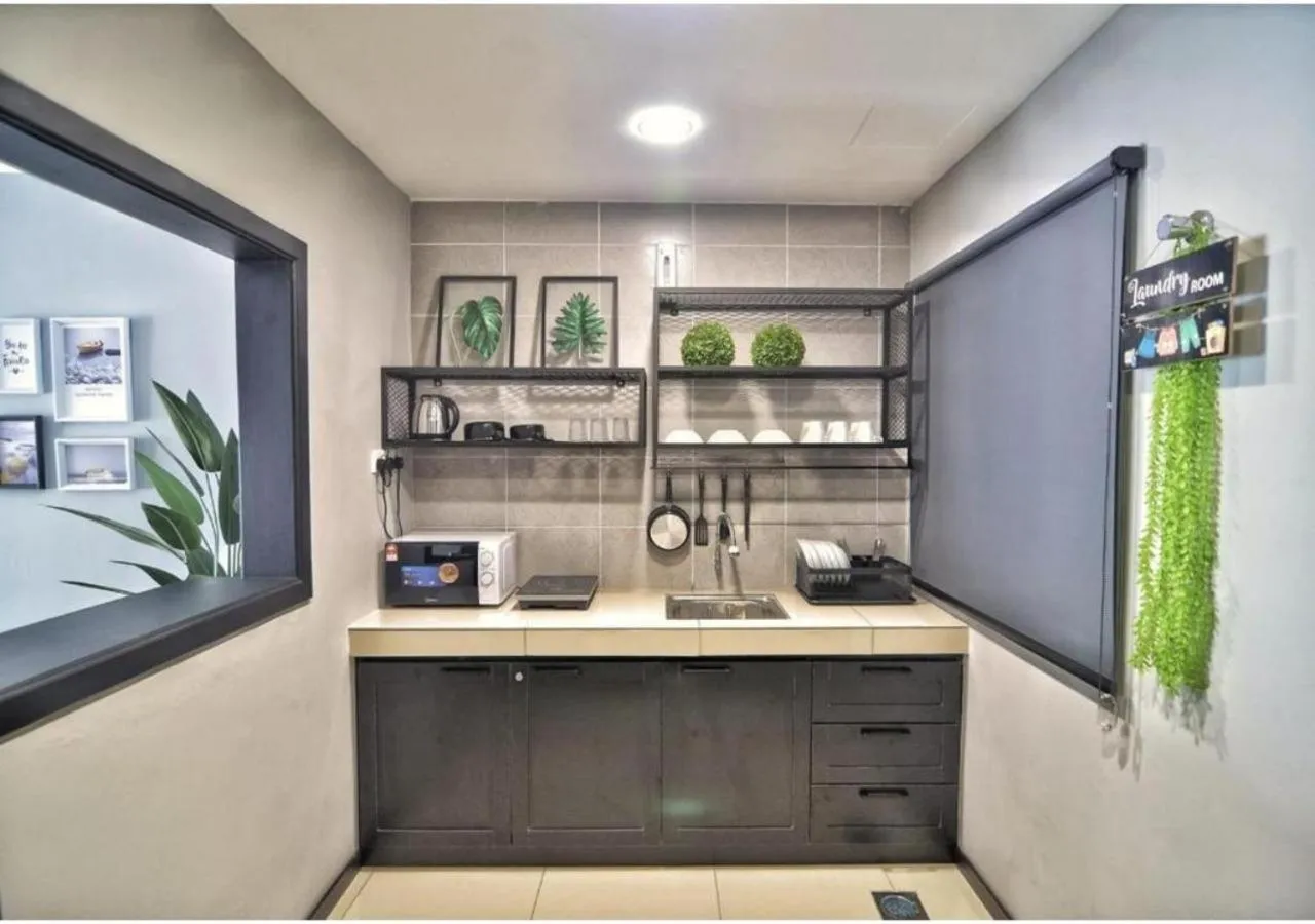Kitchen or kitchenette in Ipoh Waterpark Manhattan Premium Suites by IWH Suites