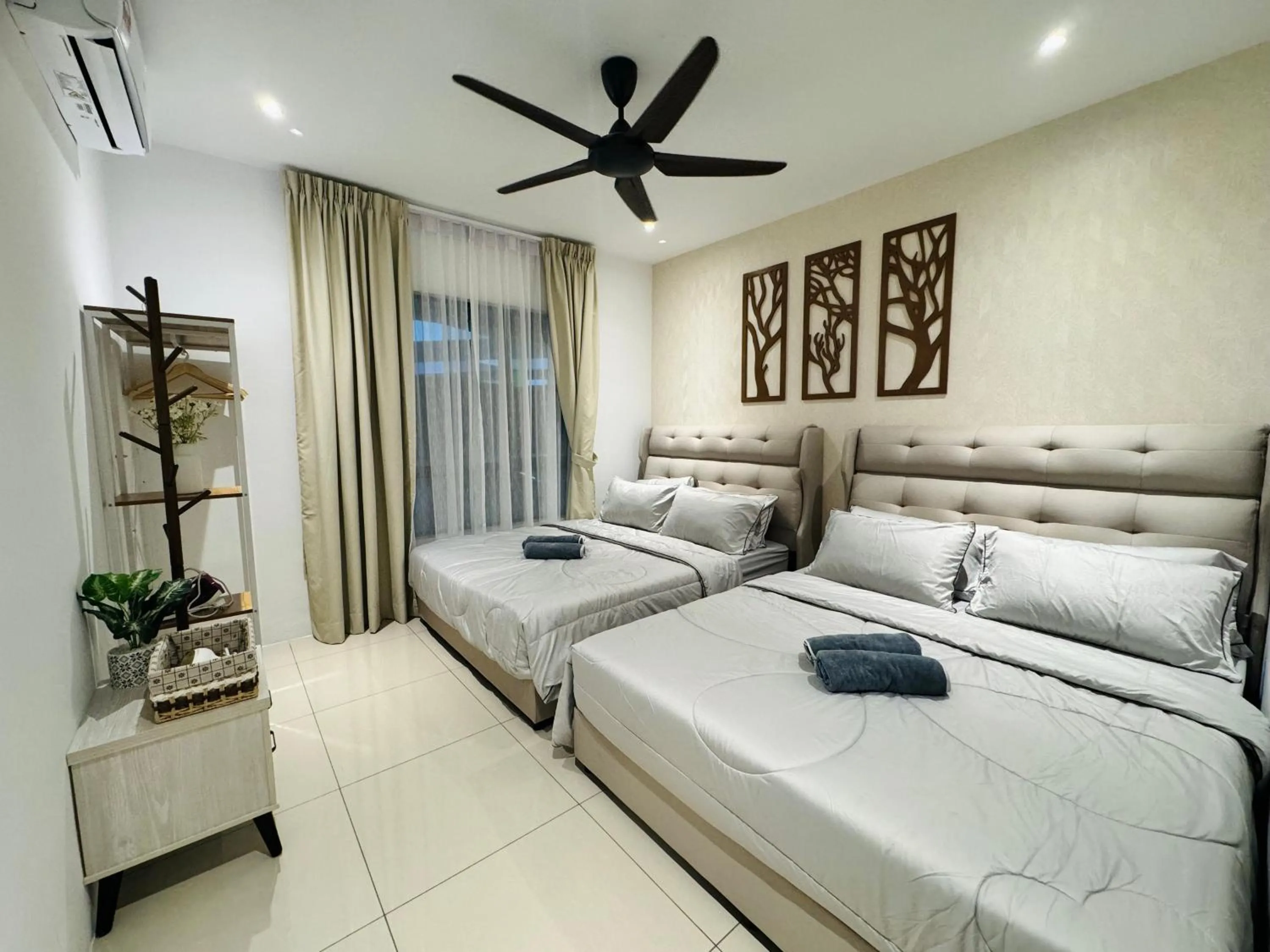 Living room, Bed in Ipoh Waterpark Manhattan Premium Suites by IWH Suites
