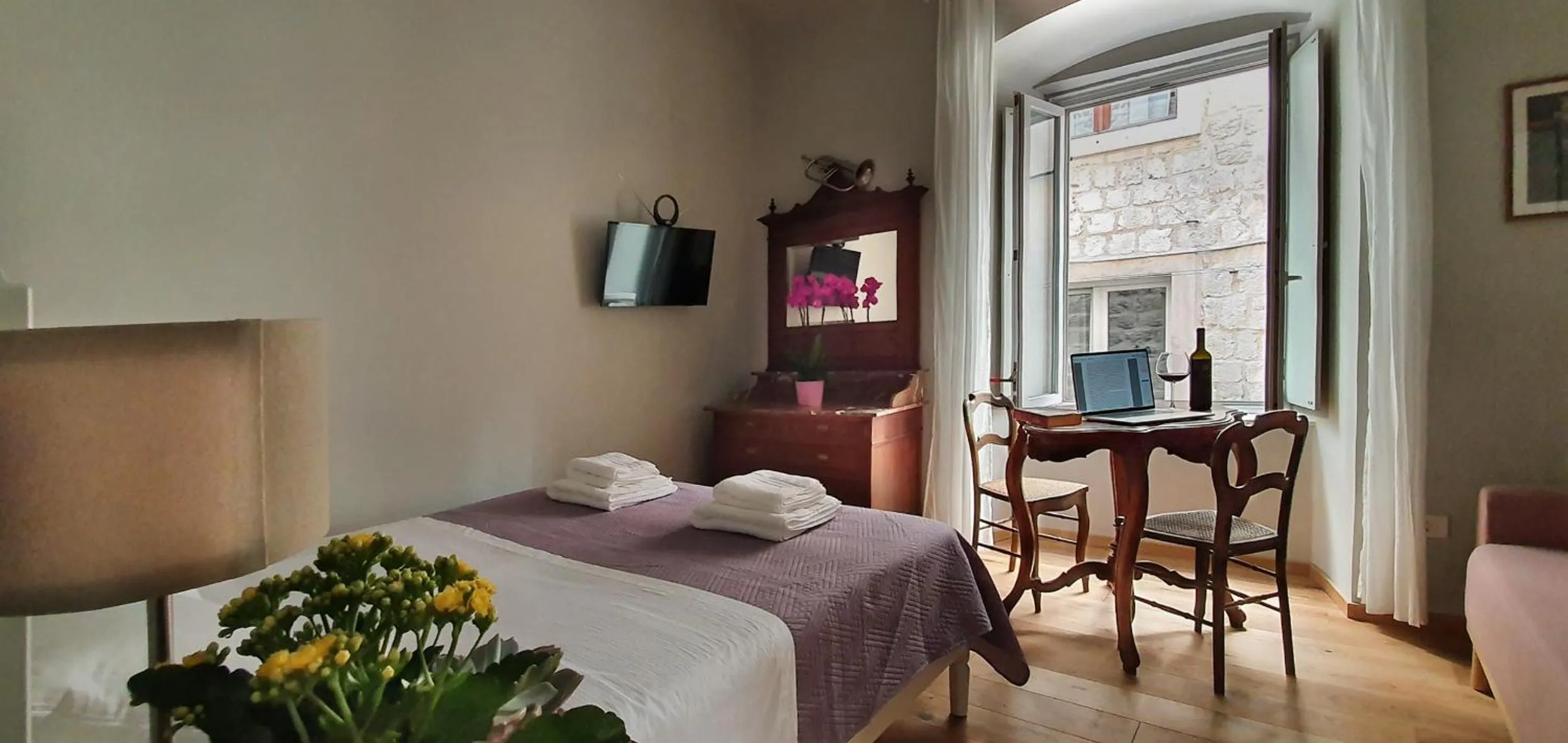 Bed in Muziqa Apartments