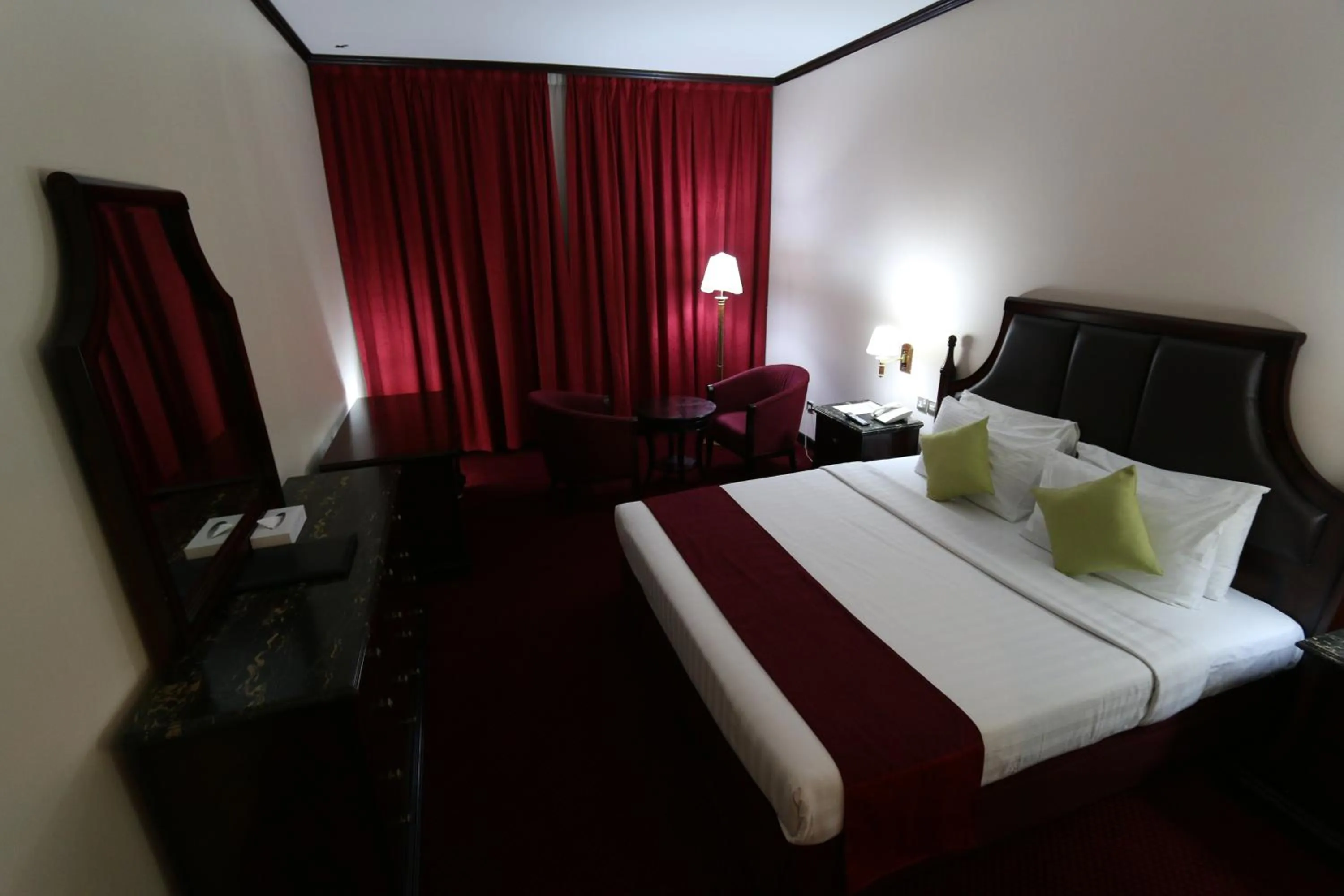 Bed in Grand Mayfair Hotel