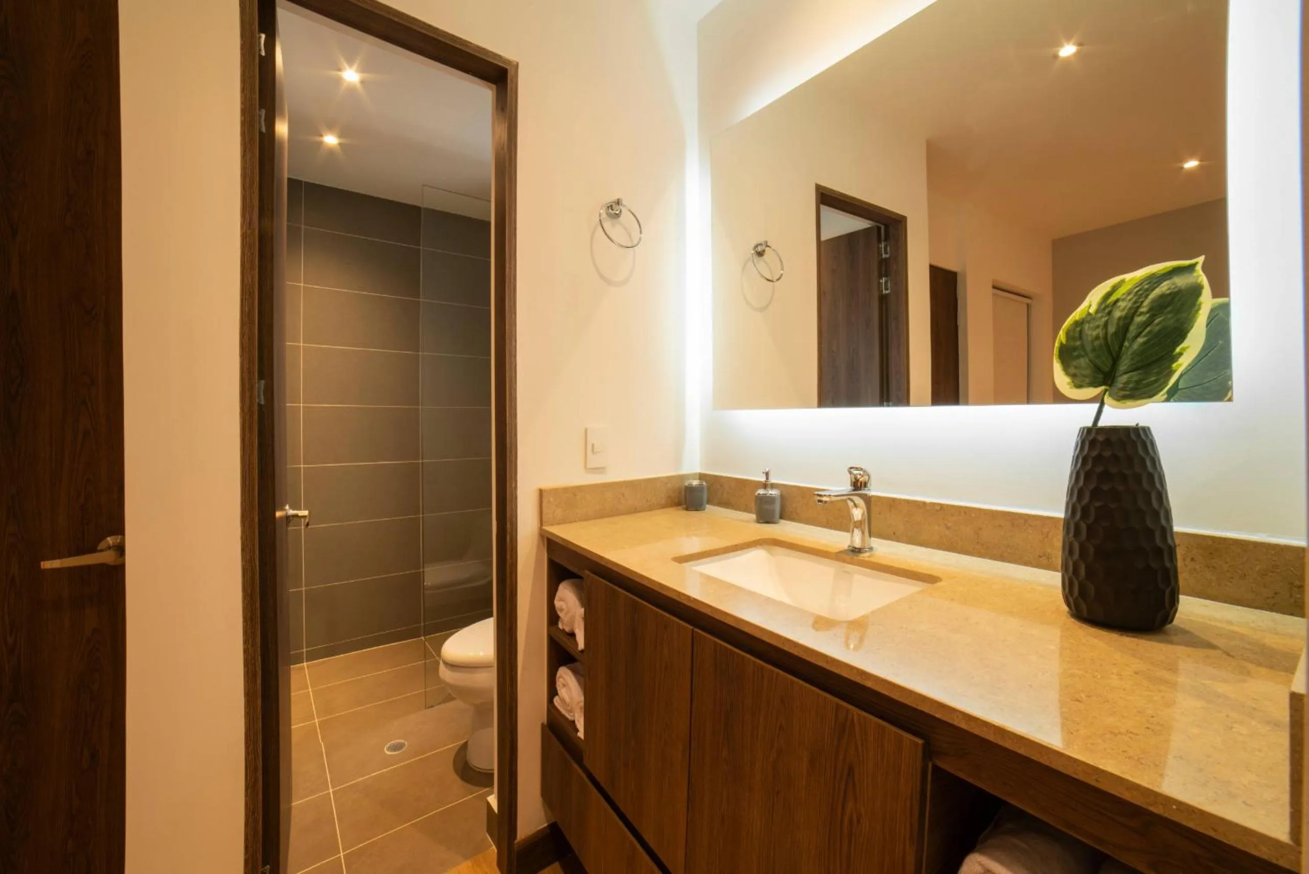 Bathroom in Cali River Suites by Yellowkey Capital