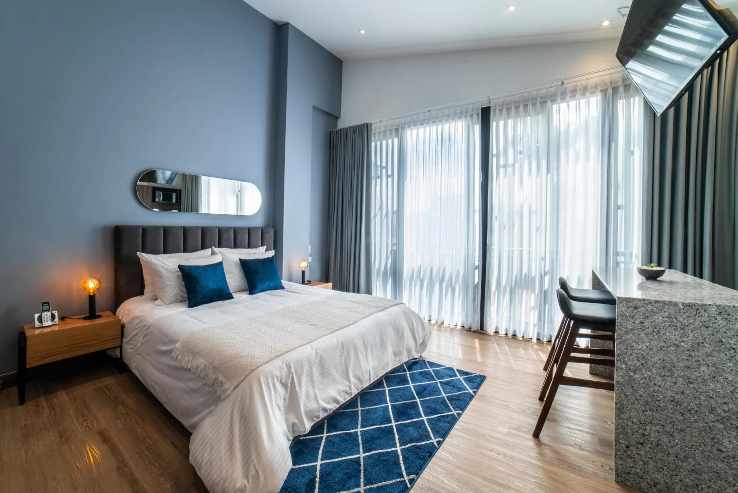 Bed in Cali River Suites by Yellowkey Capital