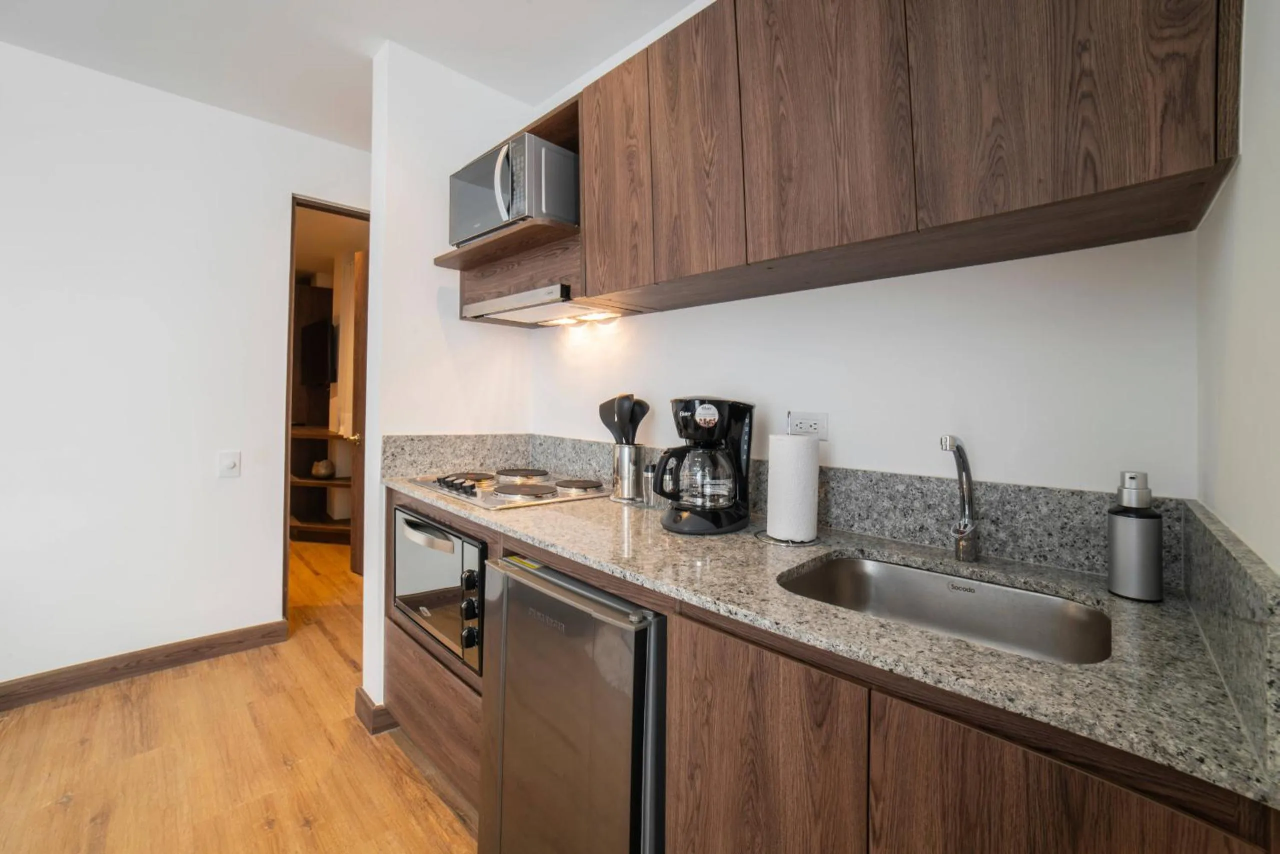 Kitchen or kitchenette in Cali River Suites by Yellowkey Capital