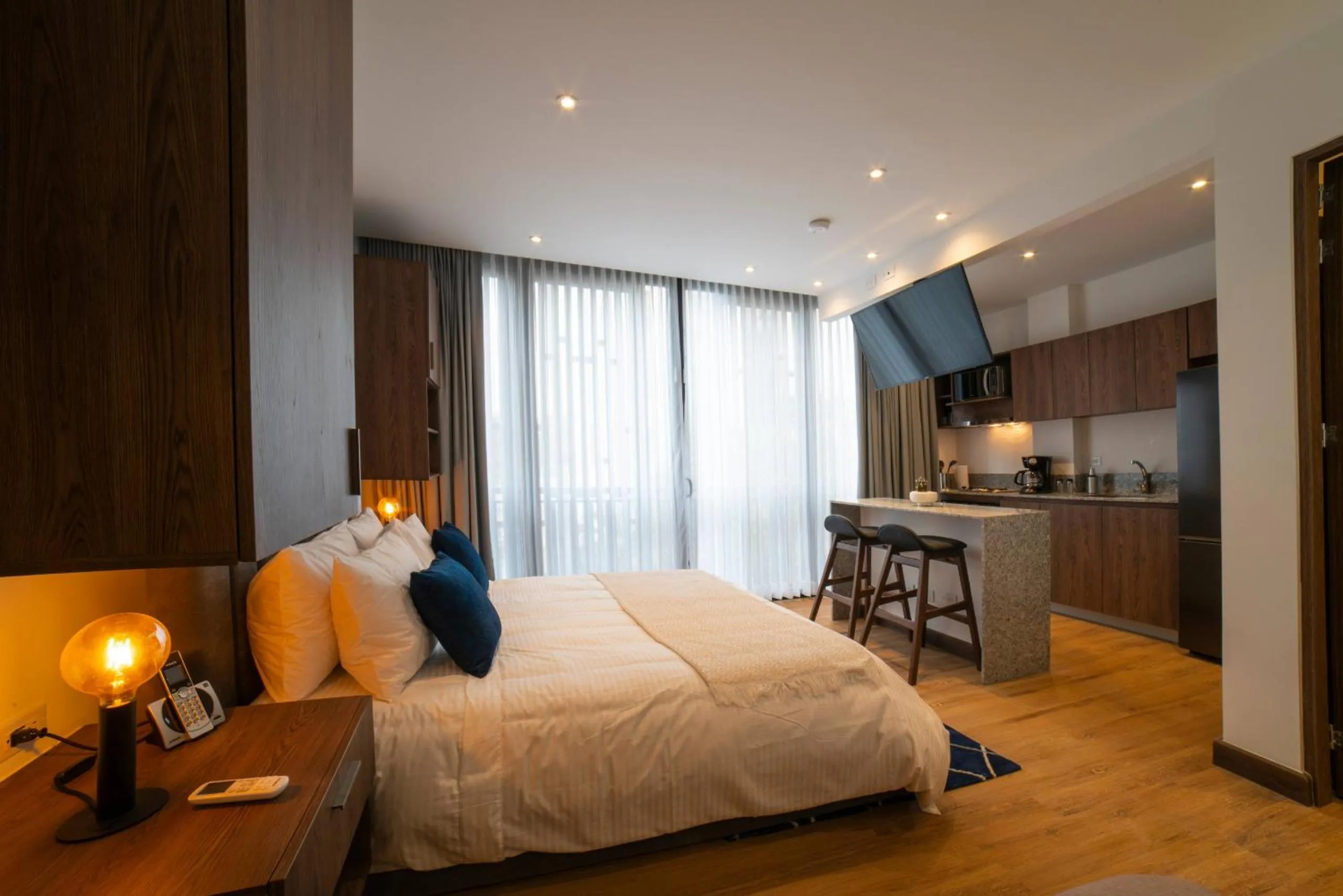 Bed in Cali River Suites by Yellowkey Capital