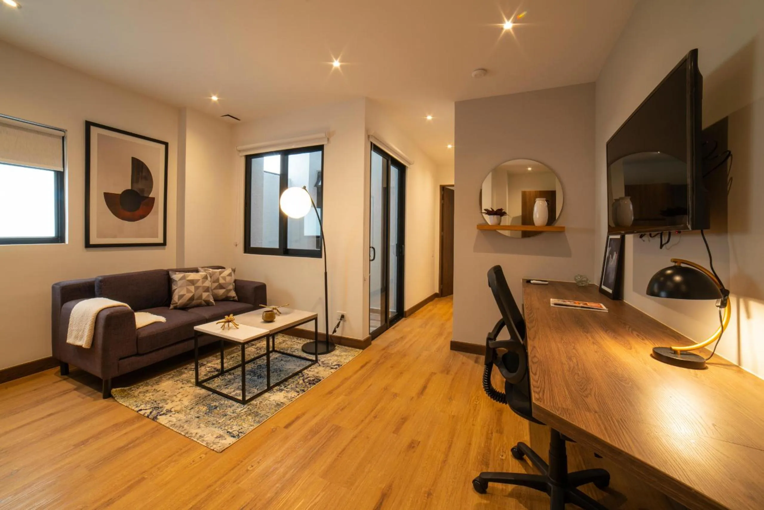 Communal lounge/ TV room in Cali River Suites by Yellowkey Capital