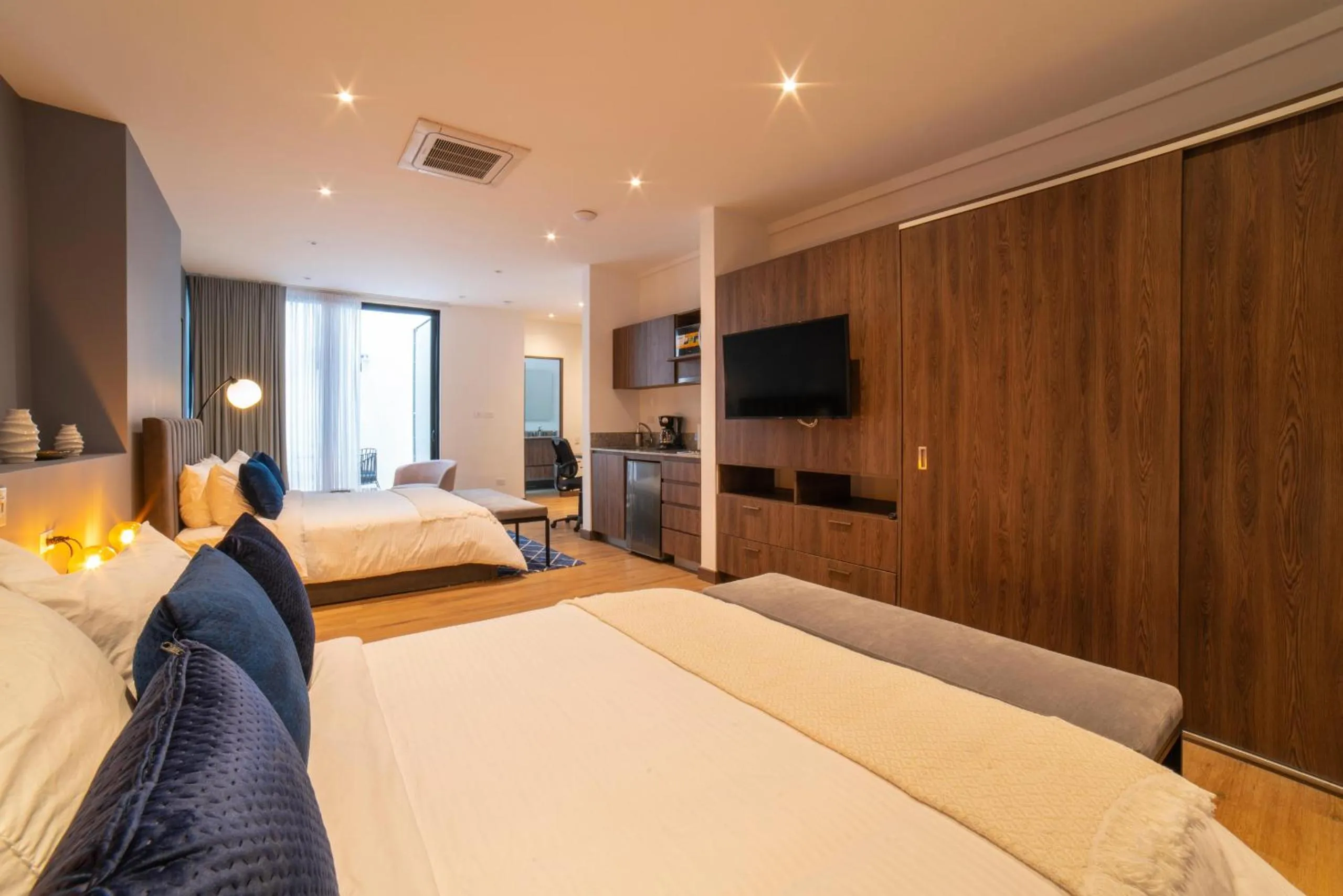 Bed in Cali River Suites by Yellowkey Capital