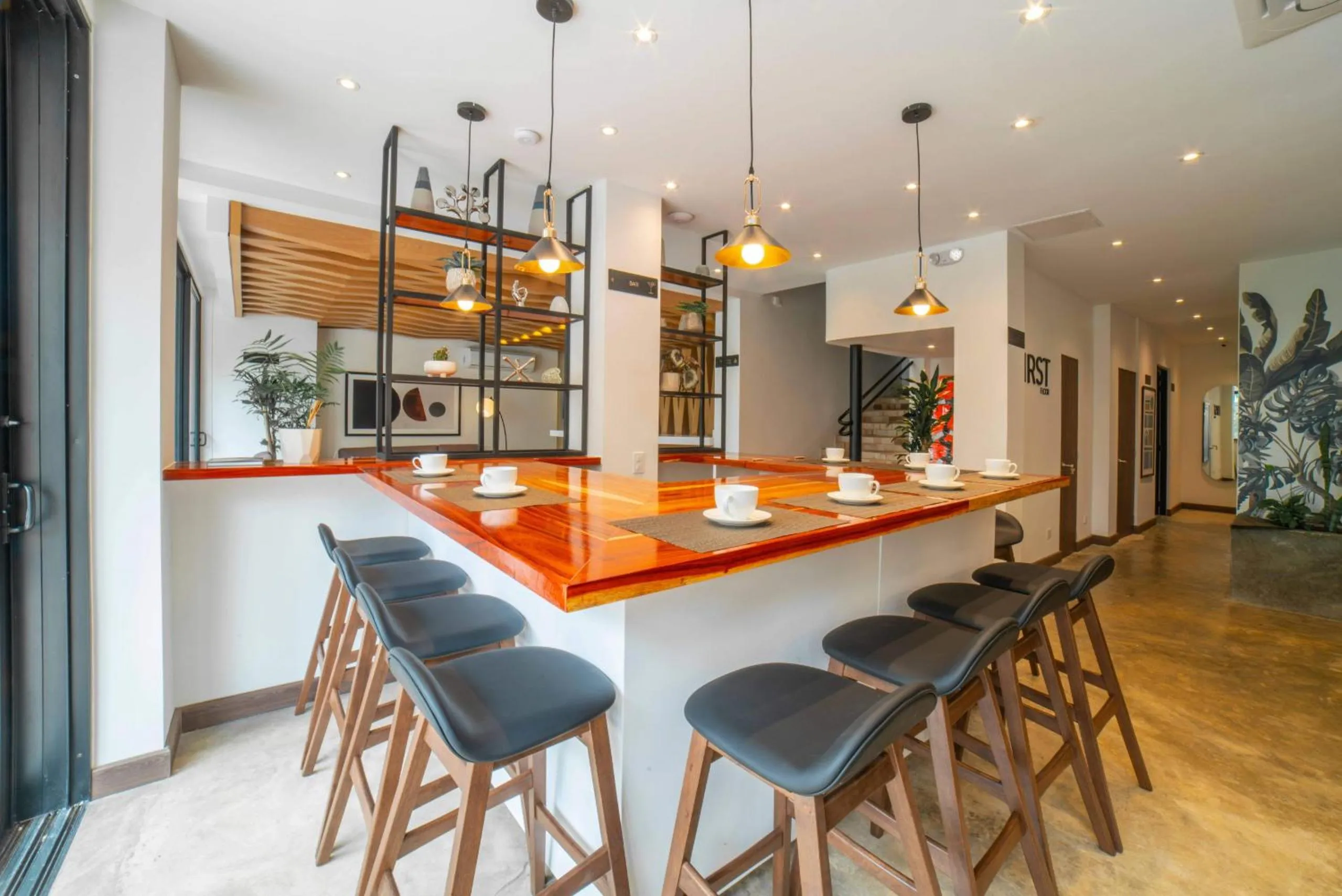 Dining area in Cali River Suites by Yellowkey Capital