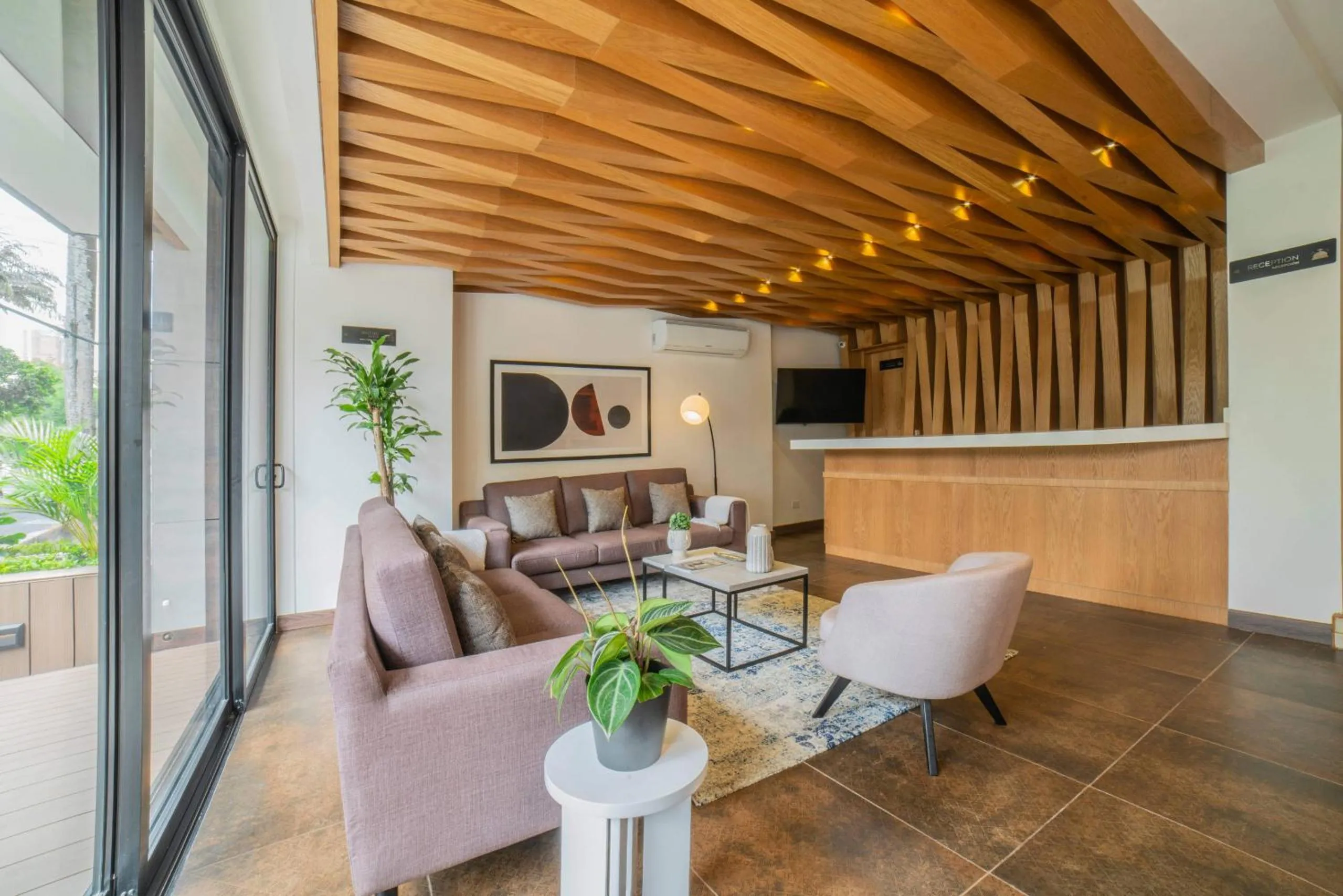 Lobby or reception in Cali River Suites by Yellowkey Capital