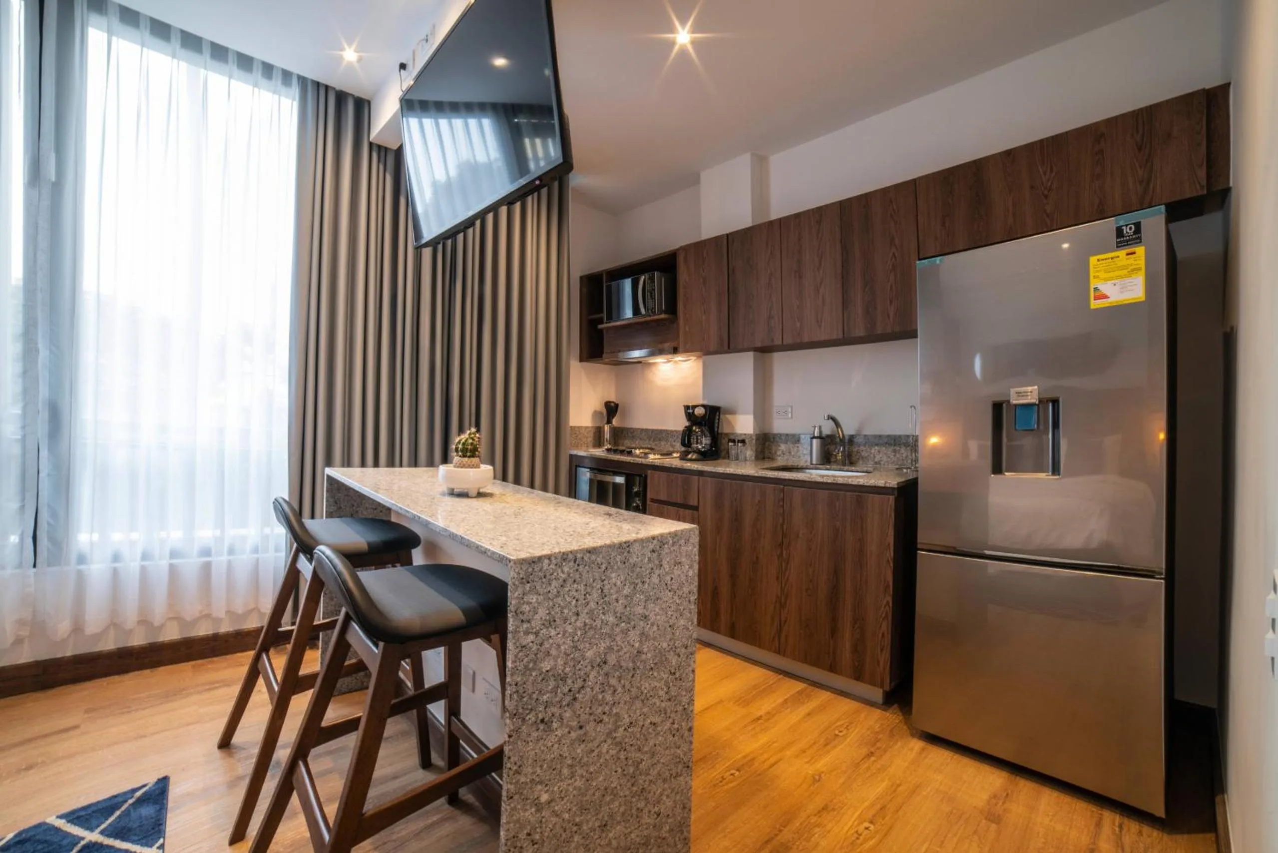 Kitchen or kitchenette in Cali River Suites by Yellowkey Capital