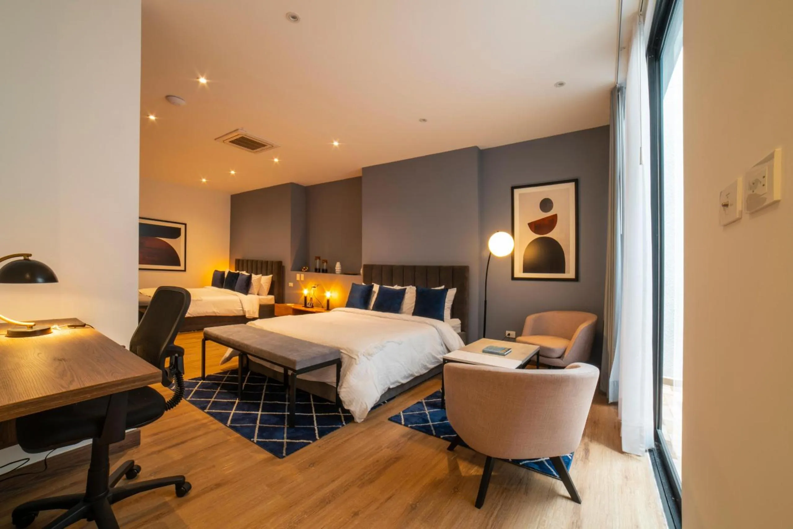 Bed in Cali River Suites by Yellowkey Capital