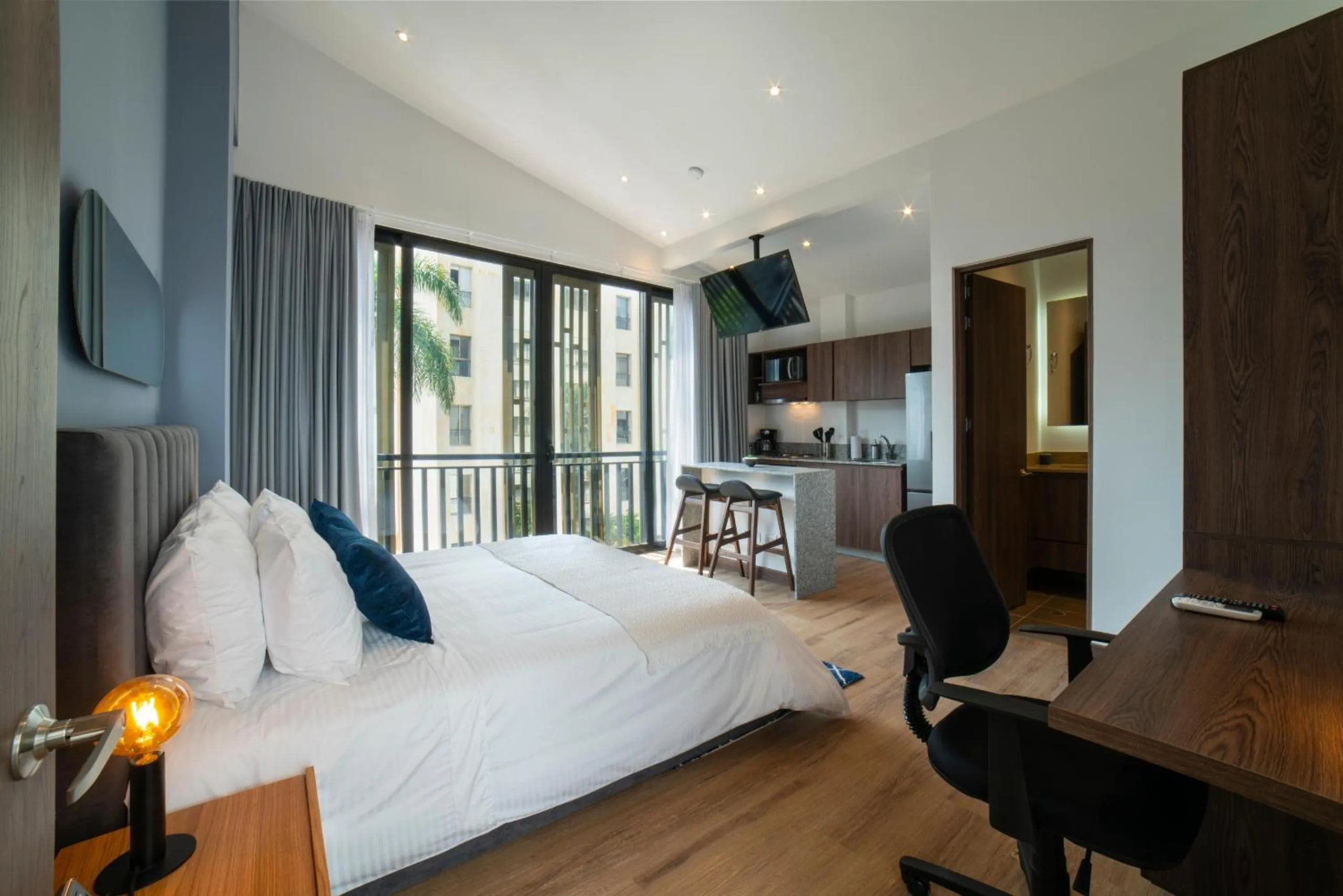 Bed in Cali River Suites by Yellowkey Capital