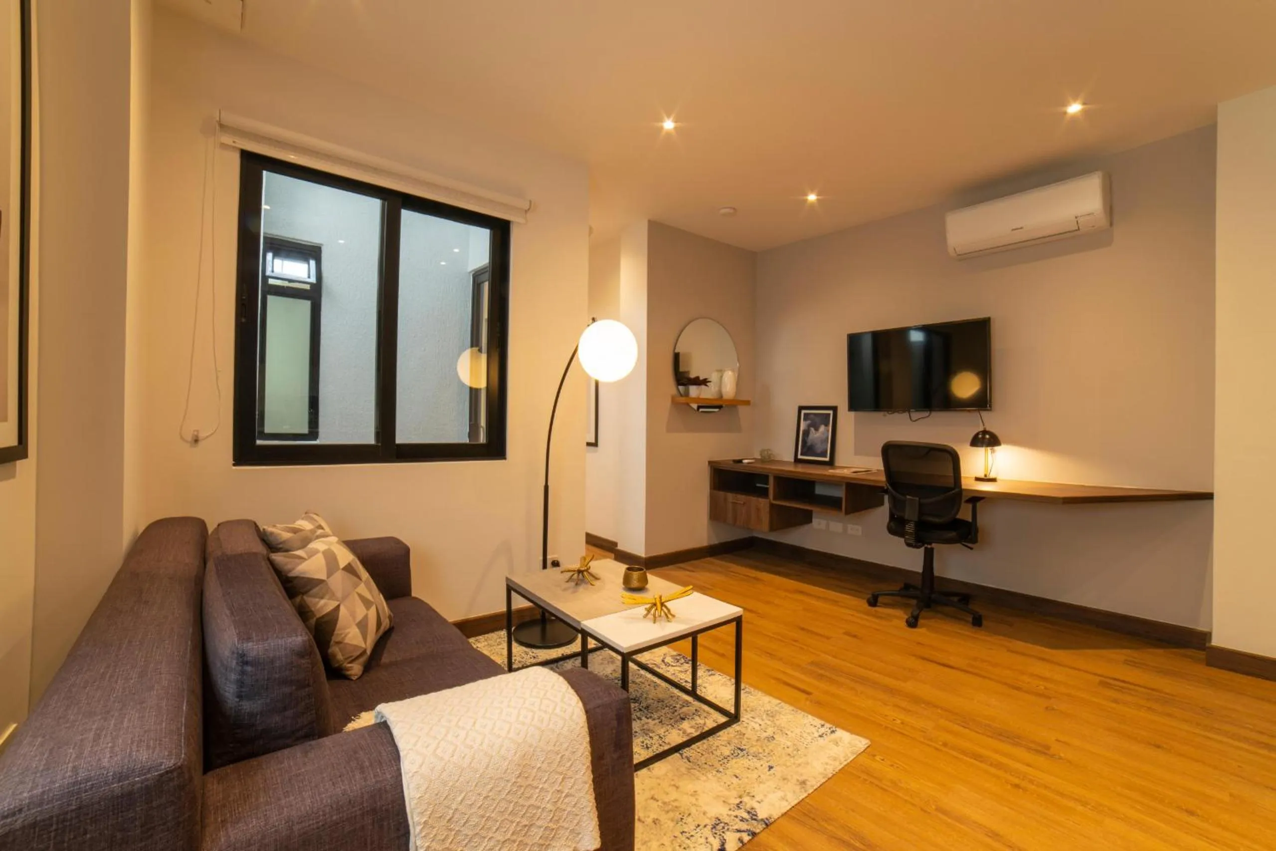 Communal lounge/ TV room in Cali River Suites by Yellowkey Capital