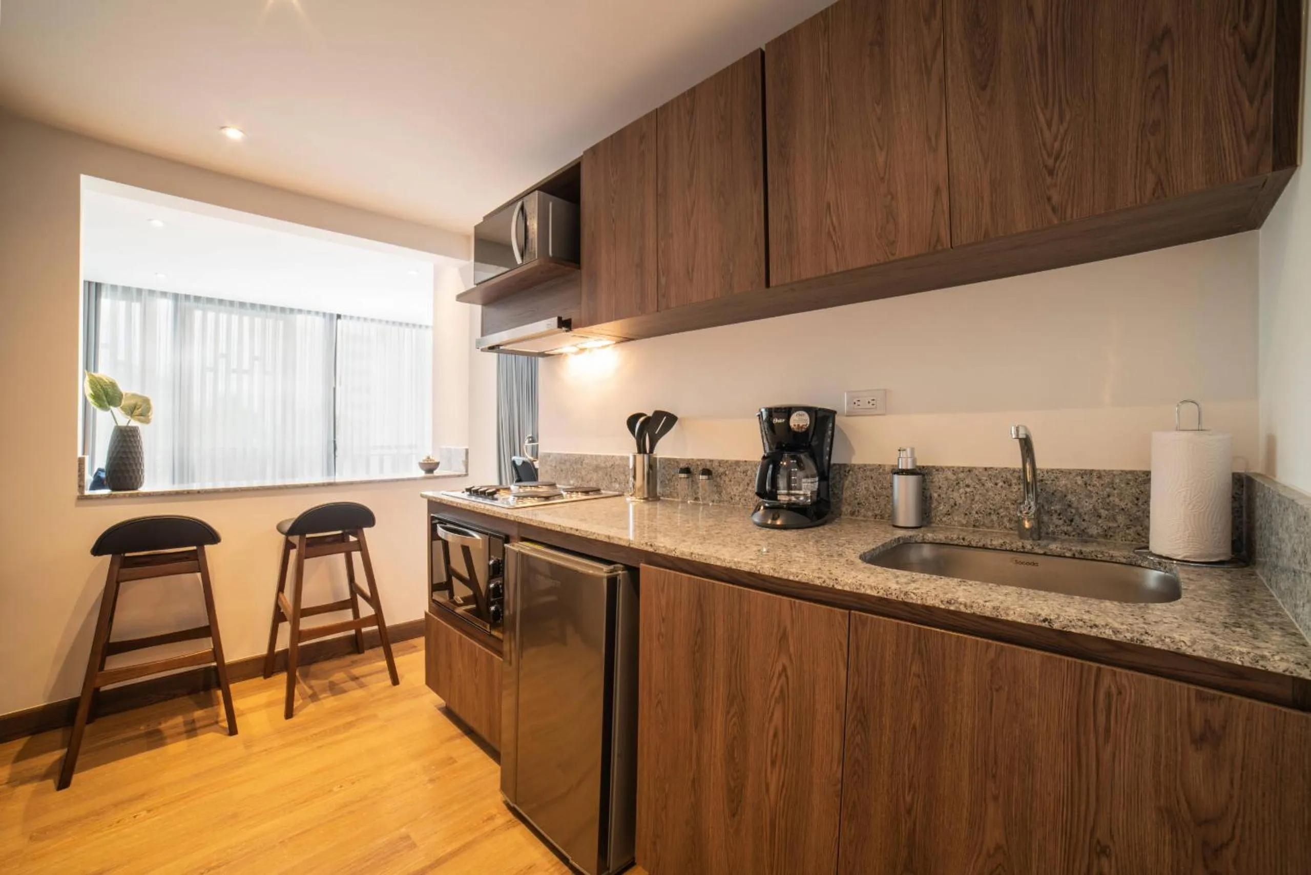 Kitchen or kitchenette in Cali River Suites by Yellowkey Capital