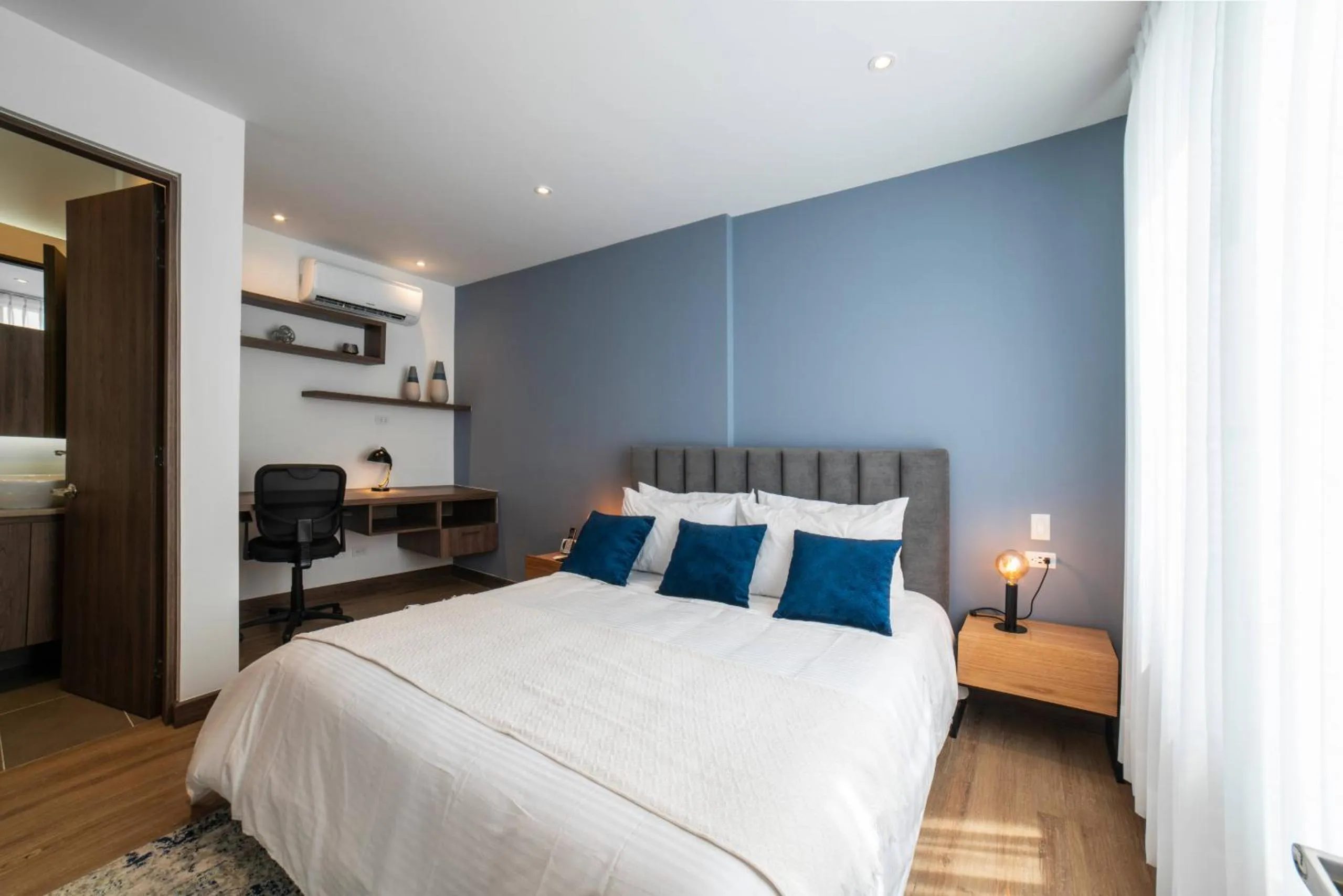 Bed in Cali River Suites by Yellowkey Capital