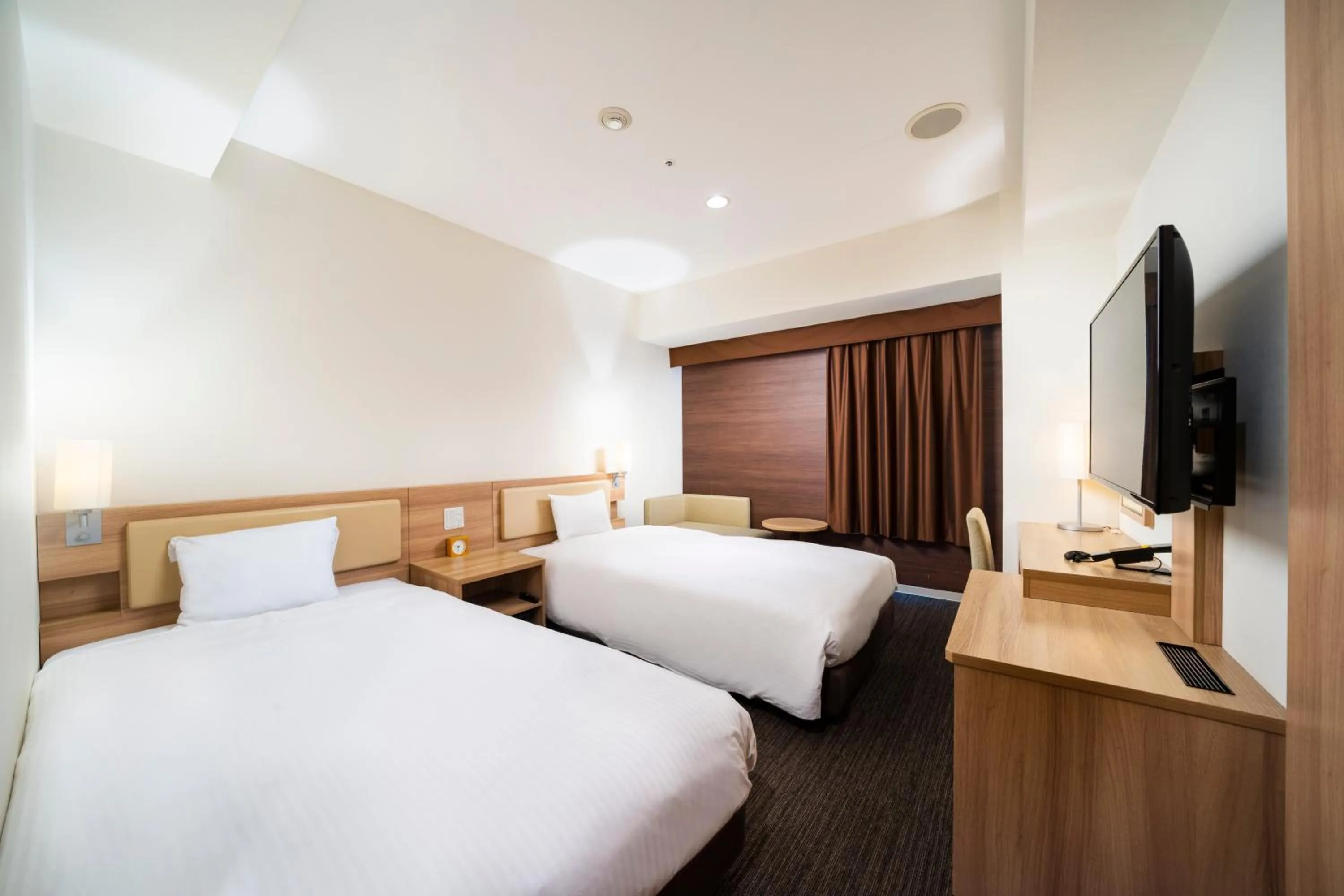 Photo of the whole room, Bed in KOKO HOTEL Sapporo Ekimae