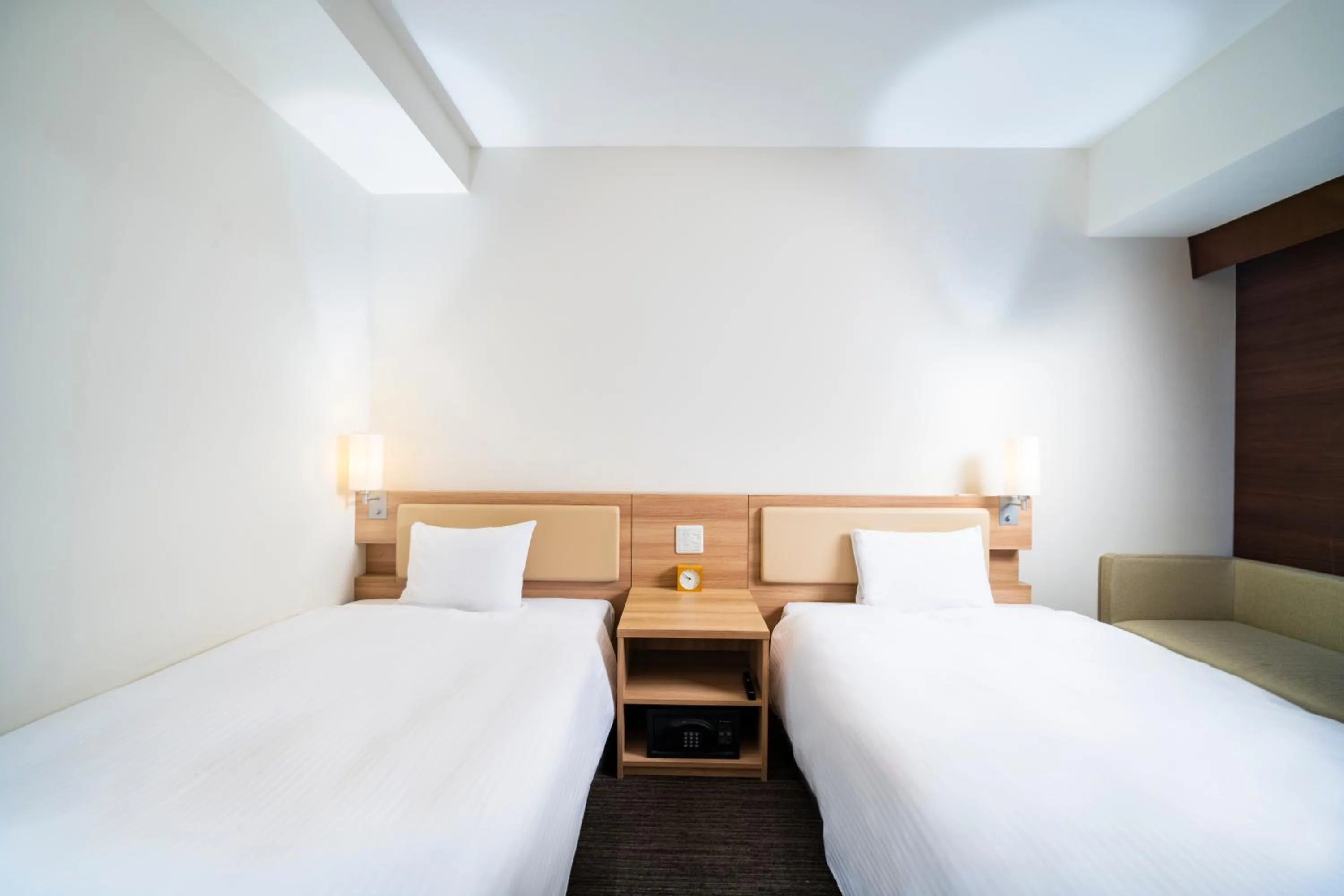 Photo of the whole room, Bed in KOKO HOTEL Sapporo Ekimae