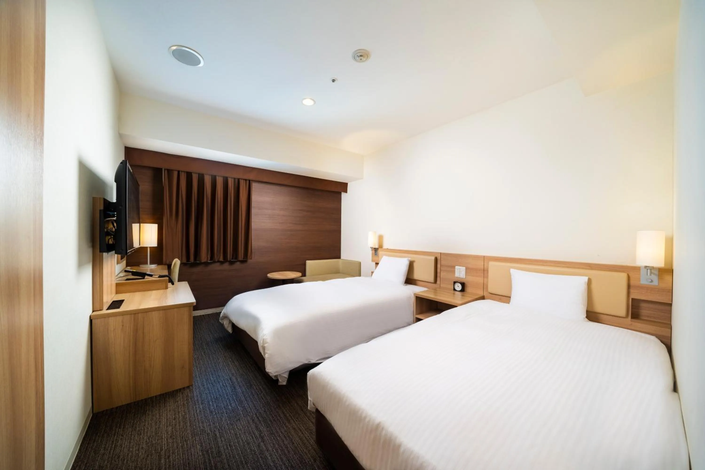 Photo of the whole room, Bed in KOKO HOTEL Sapporo Ekimae