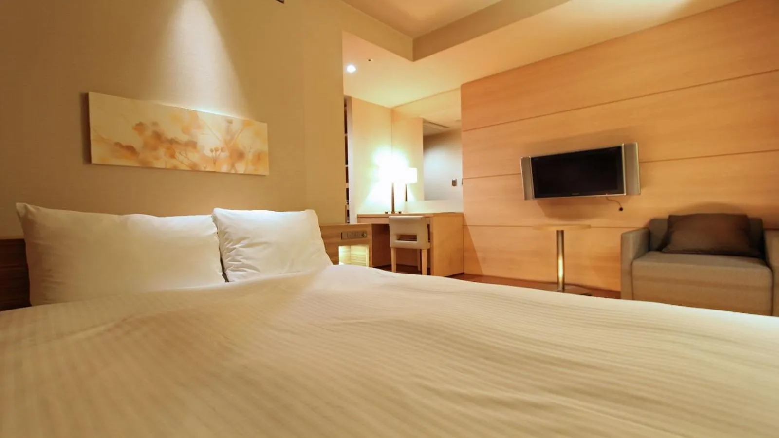 Bed in KOKO HOTEL Fukuoka Tenjin