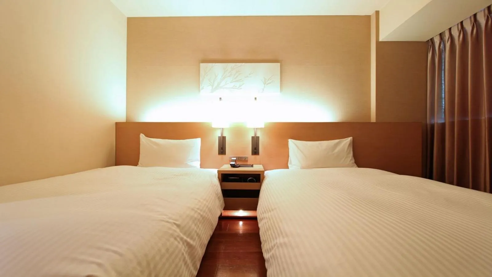 Bed in KOKO HOTEL Fukuoka Tenjin