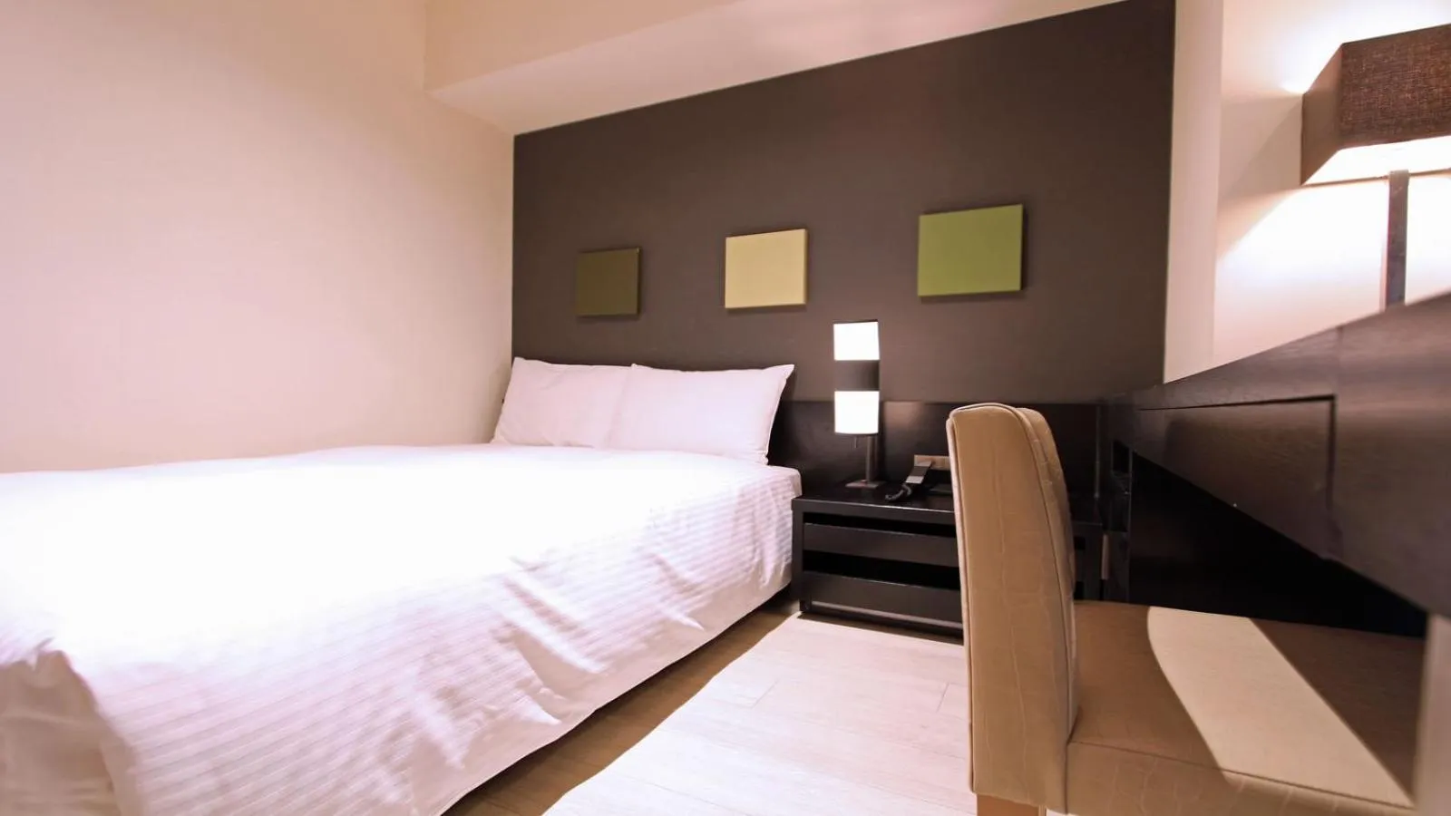 Bed in KOKO HOTEL Fukuoka Tenjin