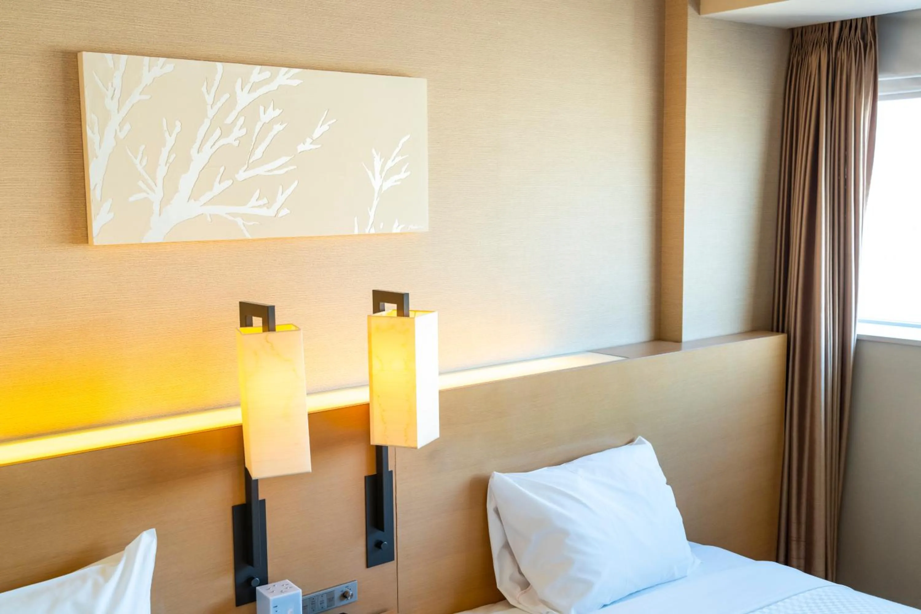 Bed in KOKO HOTEL Fukuoka Tenjin