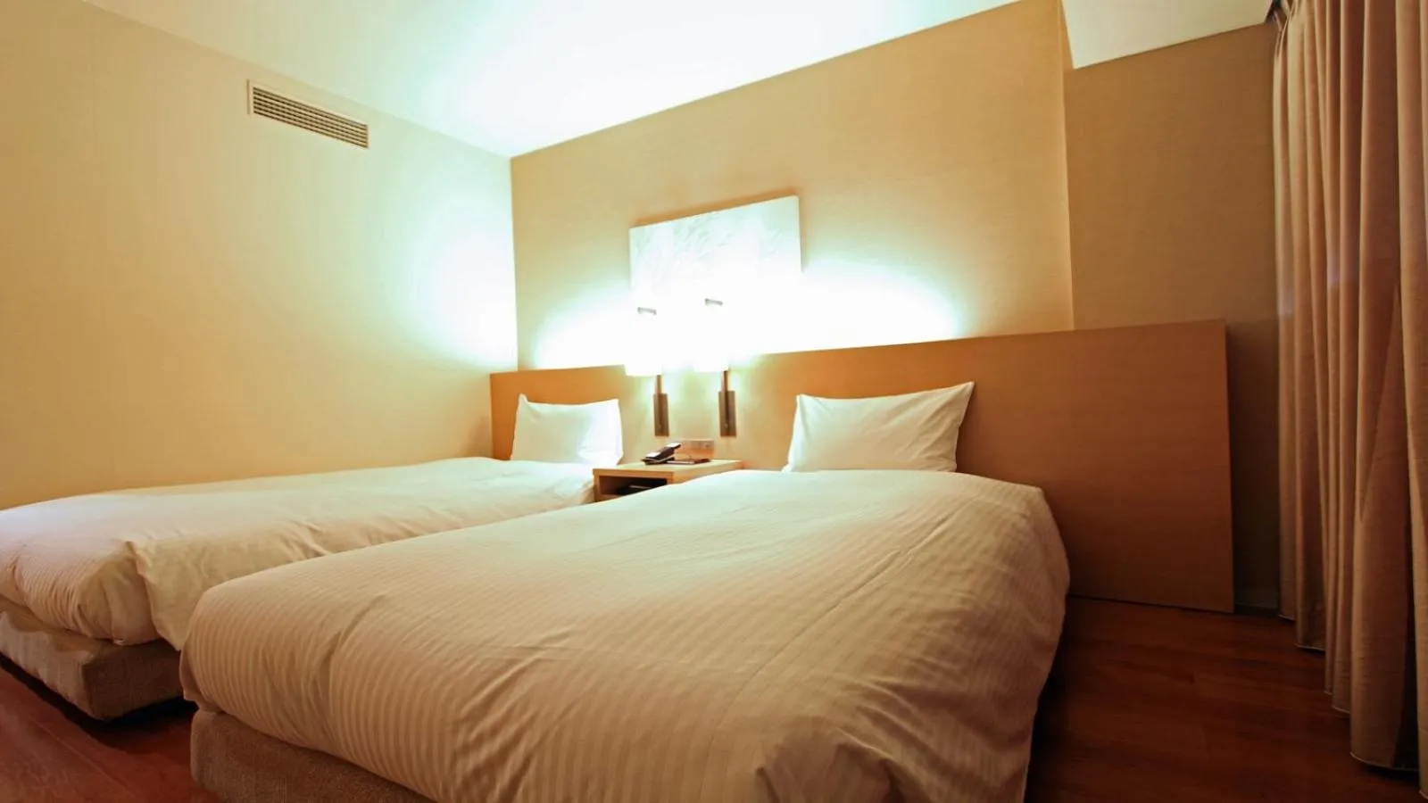 Bed in KOKO HOTEL Fukuoka Tenjin