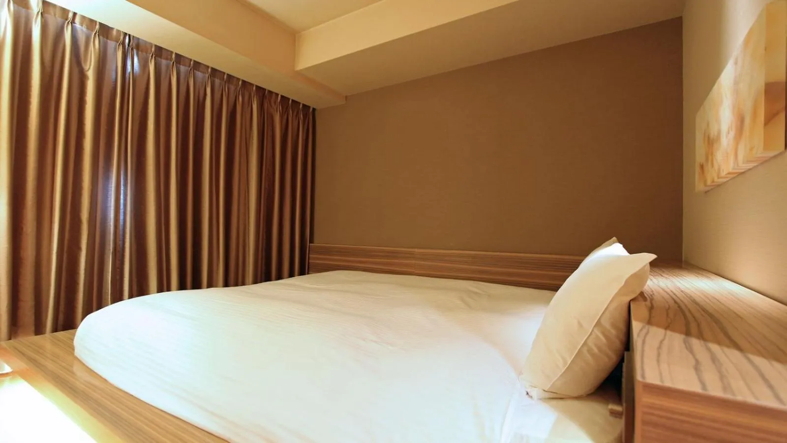 Bed in KOKO HOTEL Fukuoka Tenjin