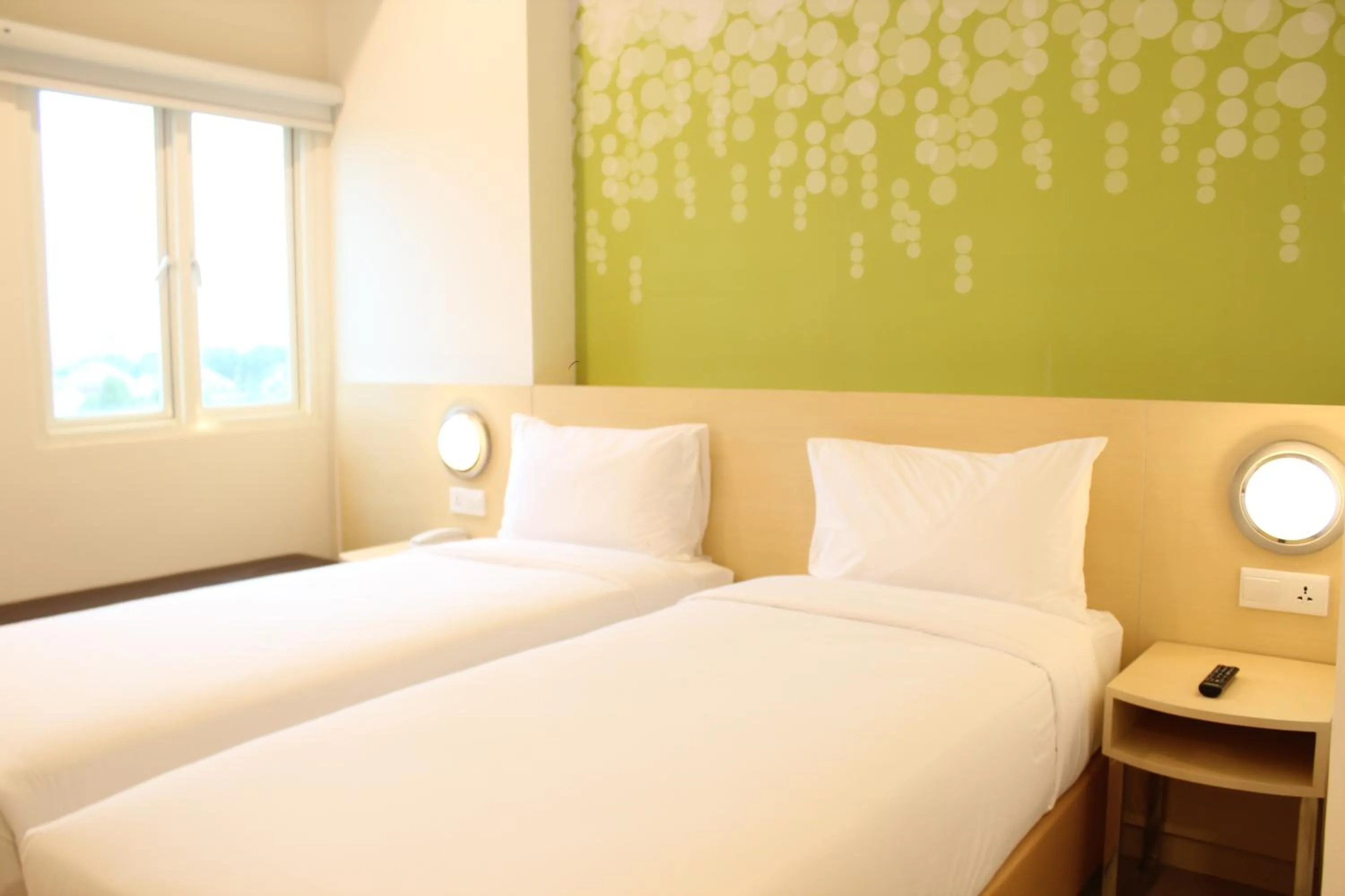 Bedroom, Bed in Zest Parang Raja Solo by Swiss-Belhotel International