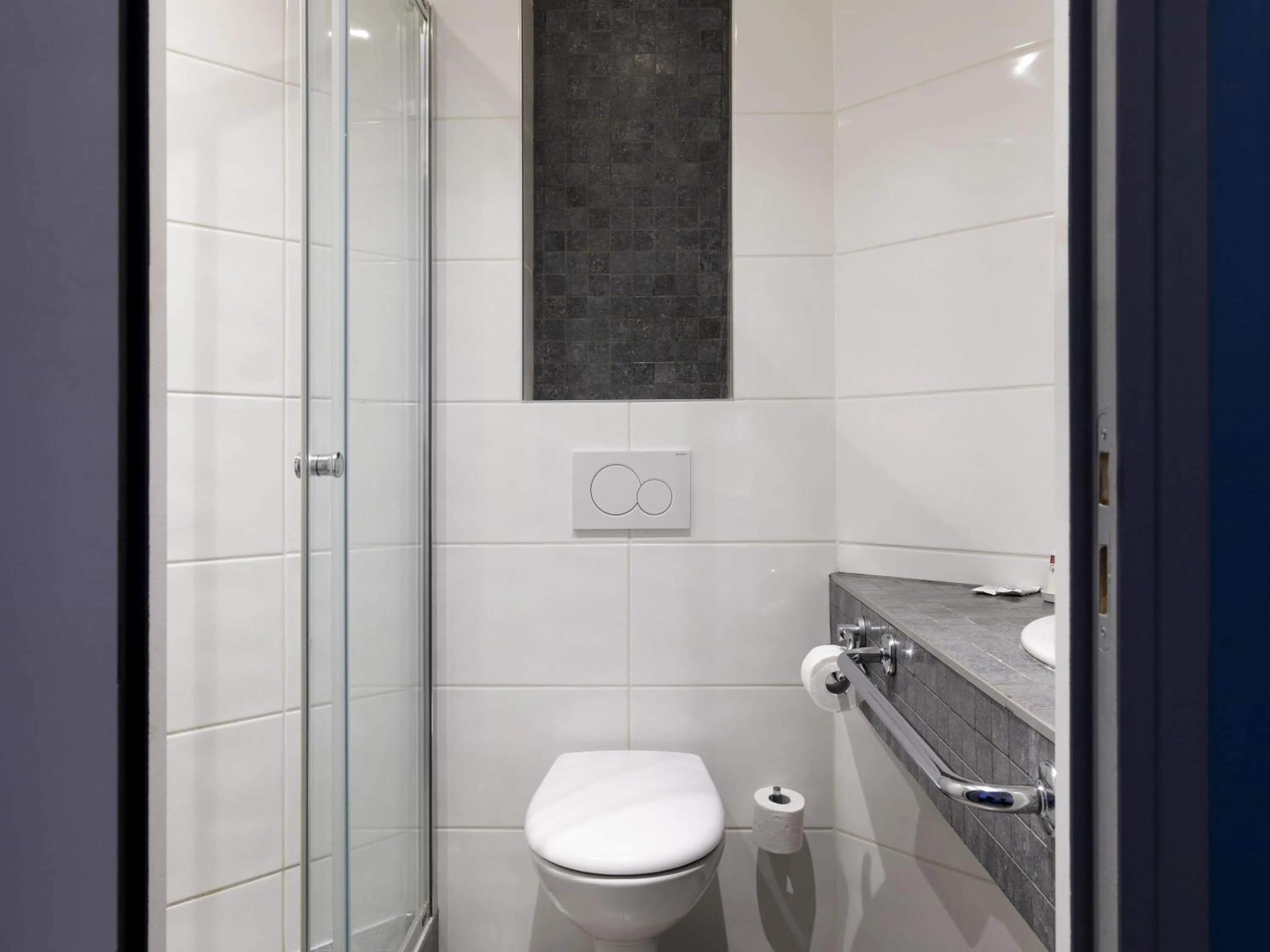 Bedroom in Ibis Budget Lyon Est Saint Quentin Fallavier