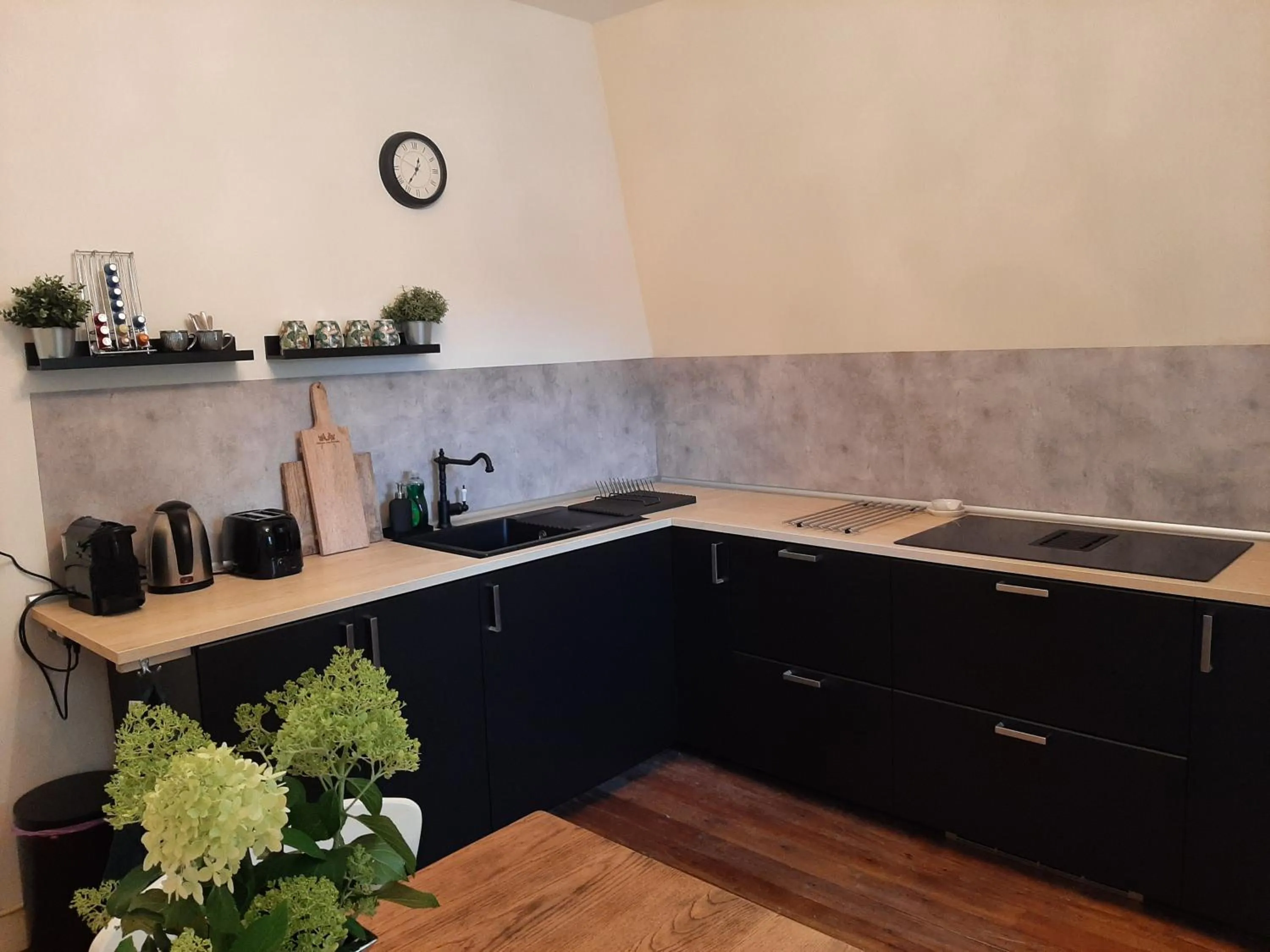 Kitchen or kitchenette in Chateau Sourliavoux, appartement en chambres d'hôtes