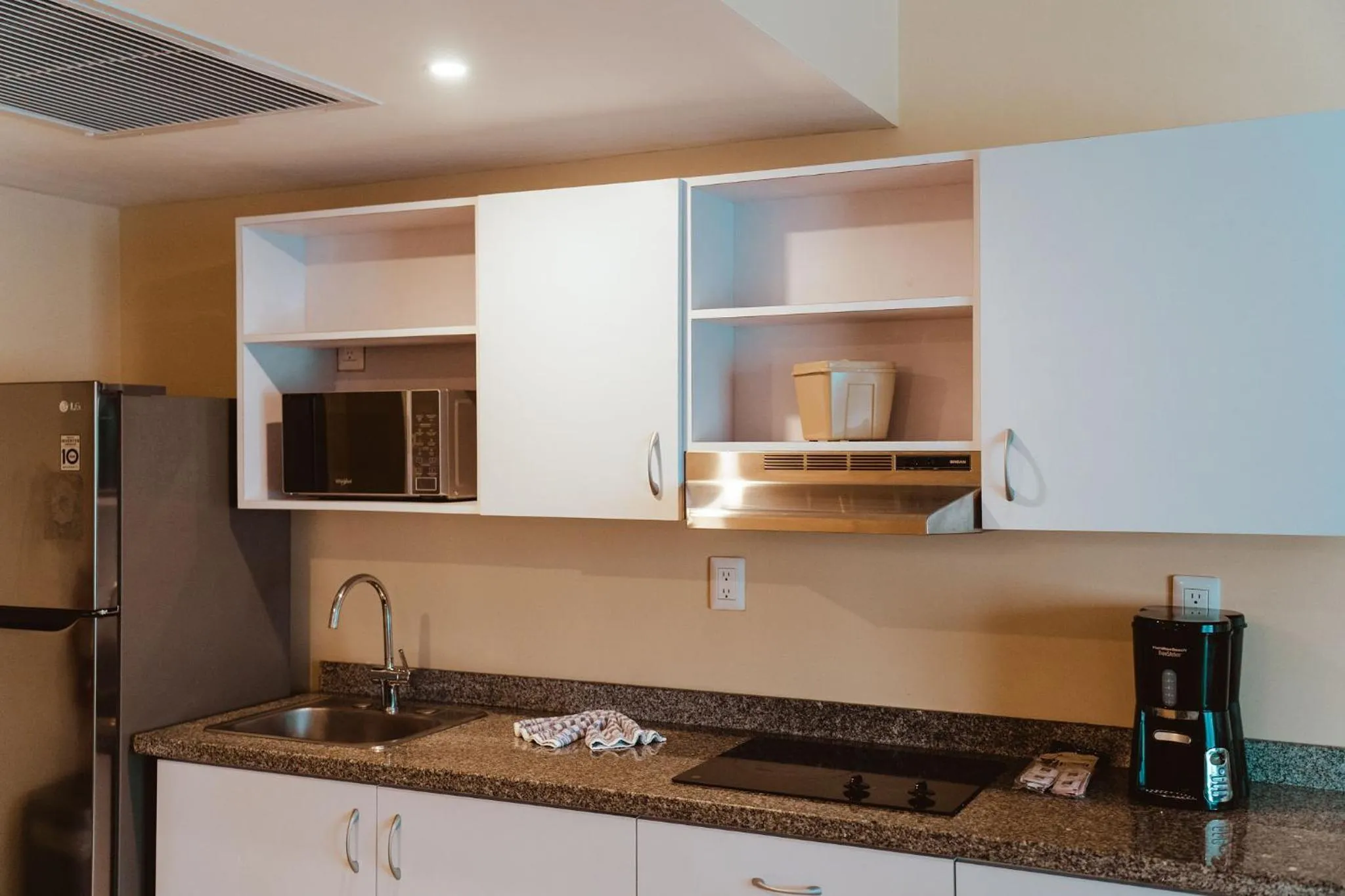 kitchen in The Mill Resort and Suites