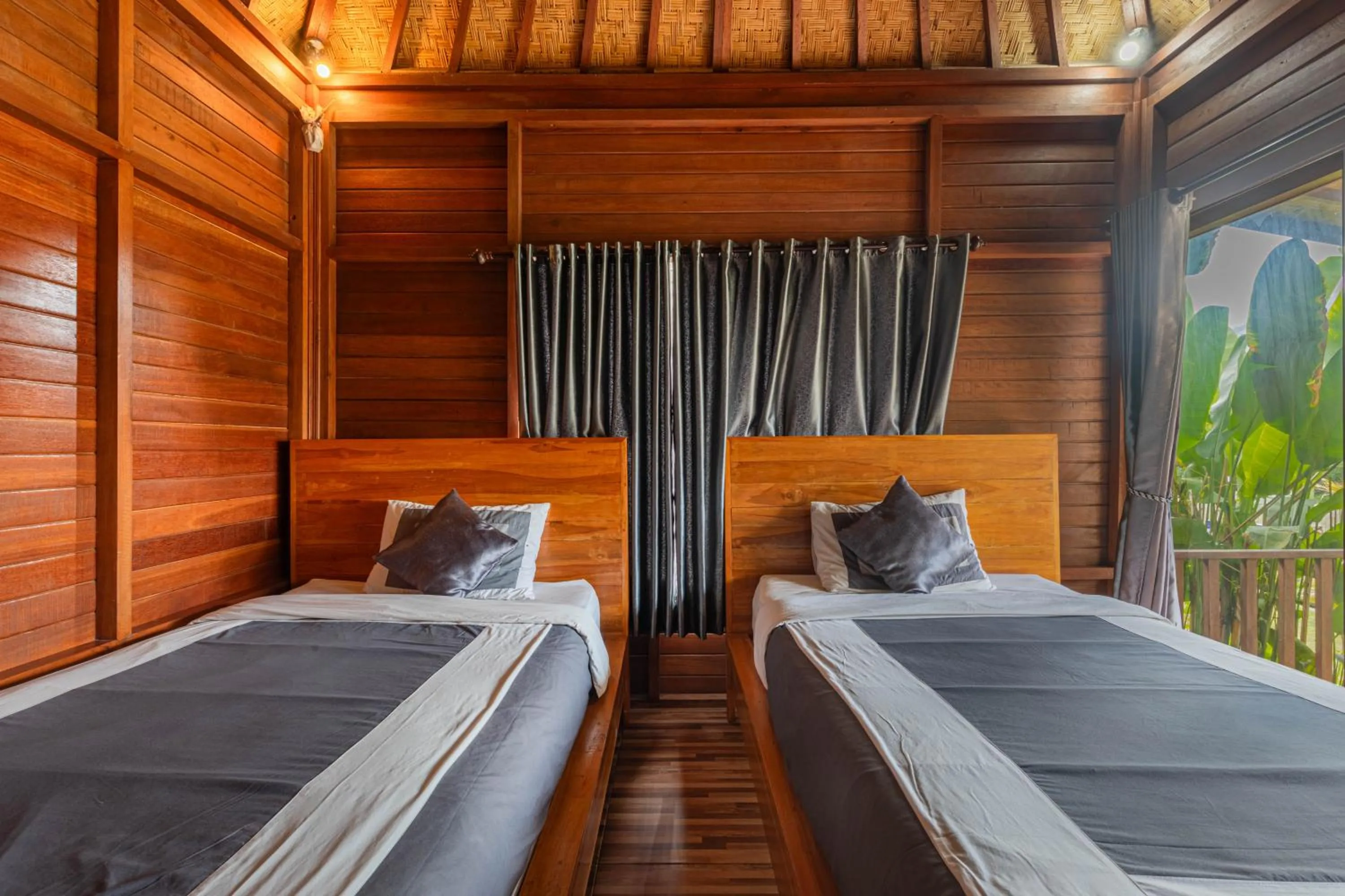 Bed in Cabana Bali Villa