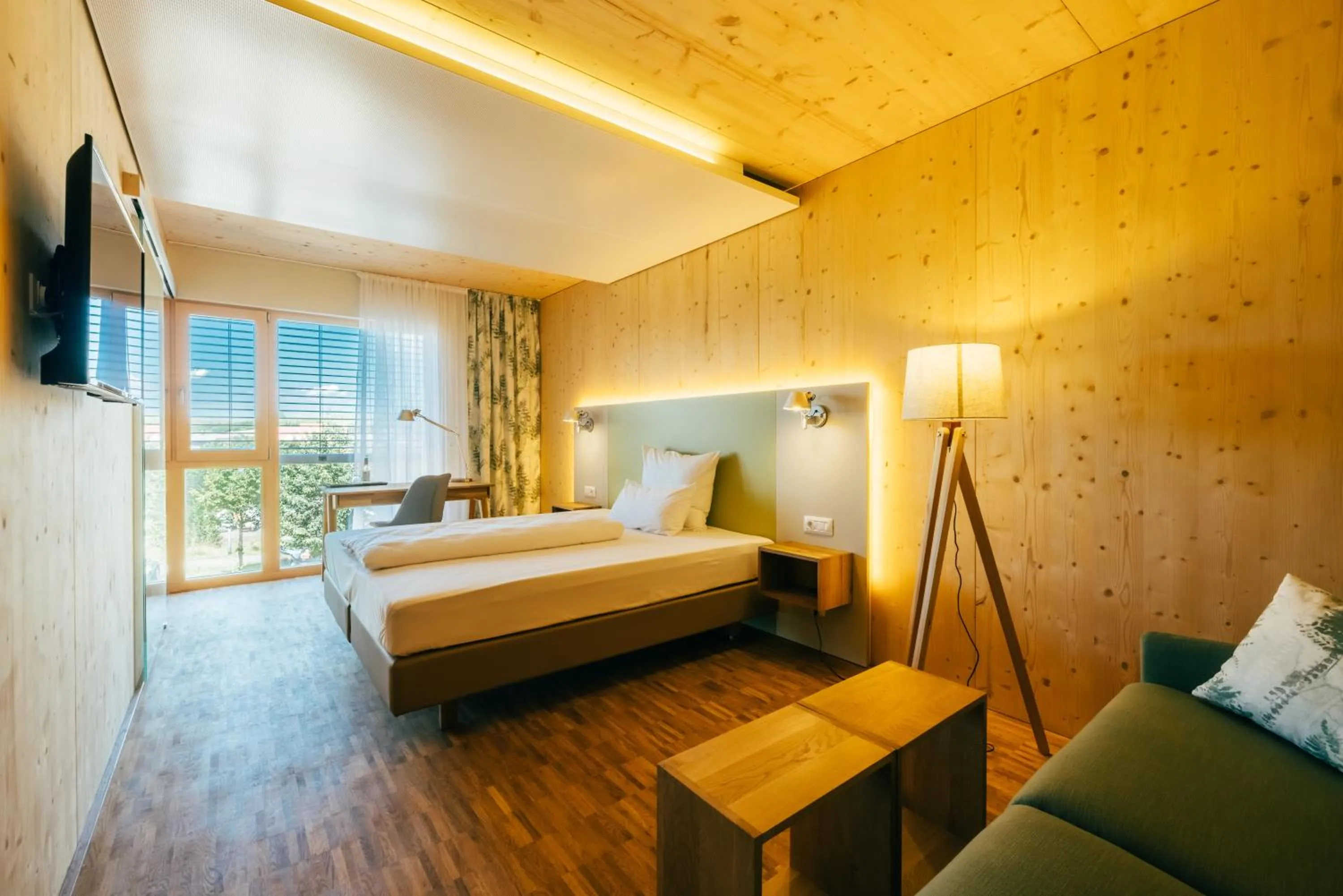 Bed in Ökohotel aus Holz Alea Eco